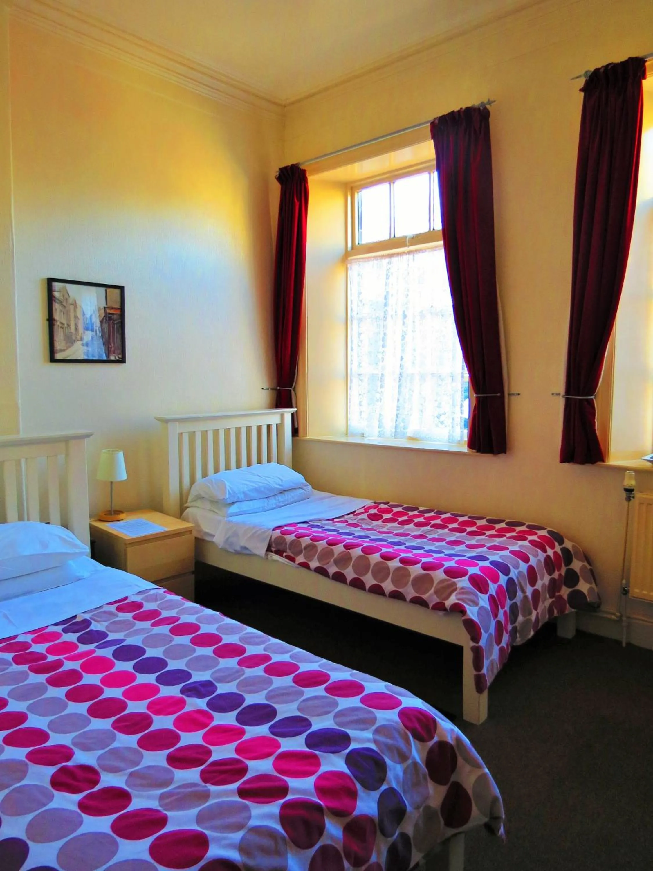 Bed in The Apothecary Guest House