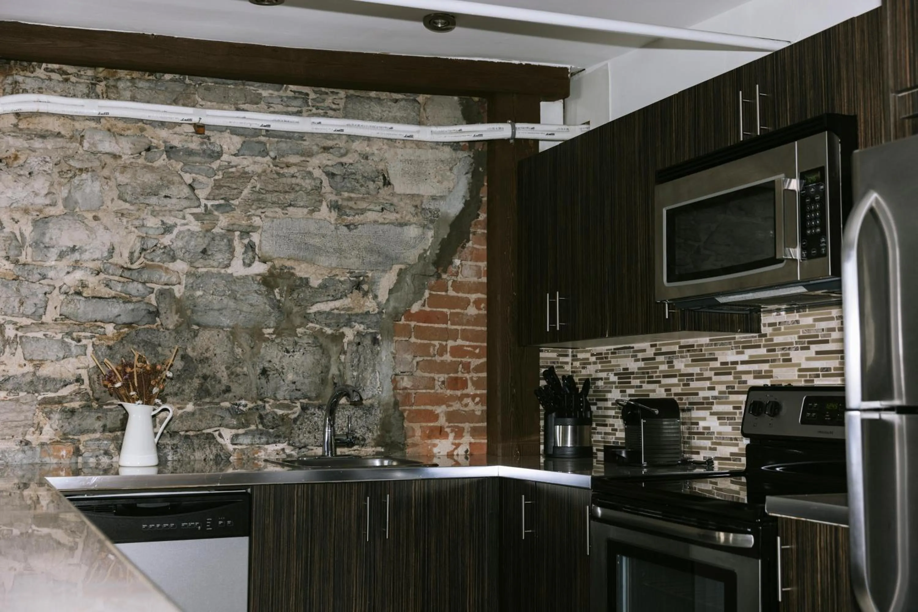 kitchen in Lofts du Vieux-Port by Gray Collection