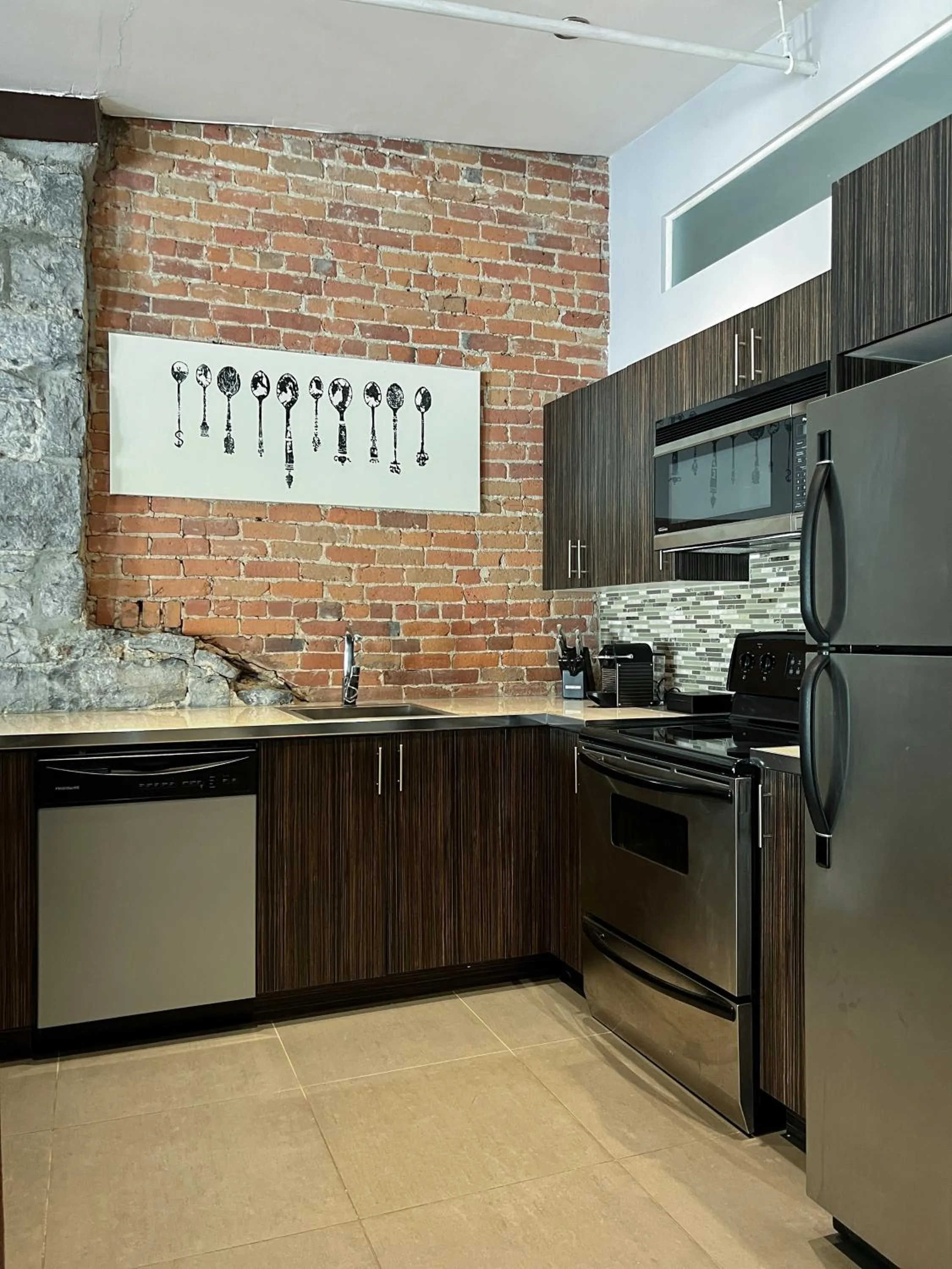 Kitchen or kitchenette in Lofts du Vieux-Port by Gray Collection