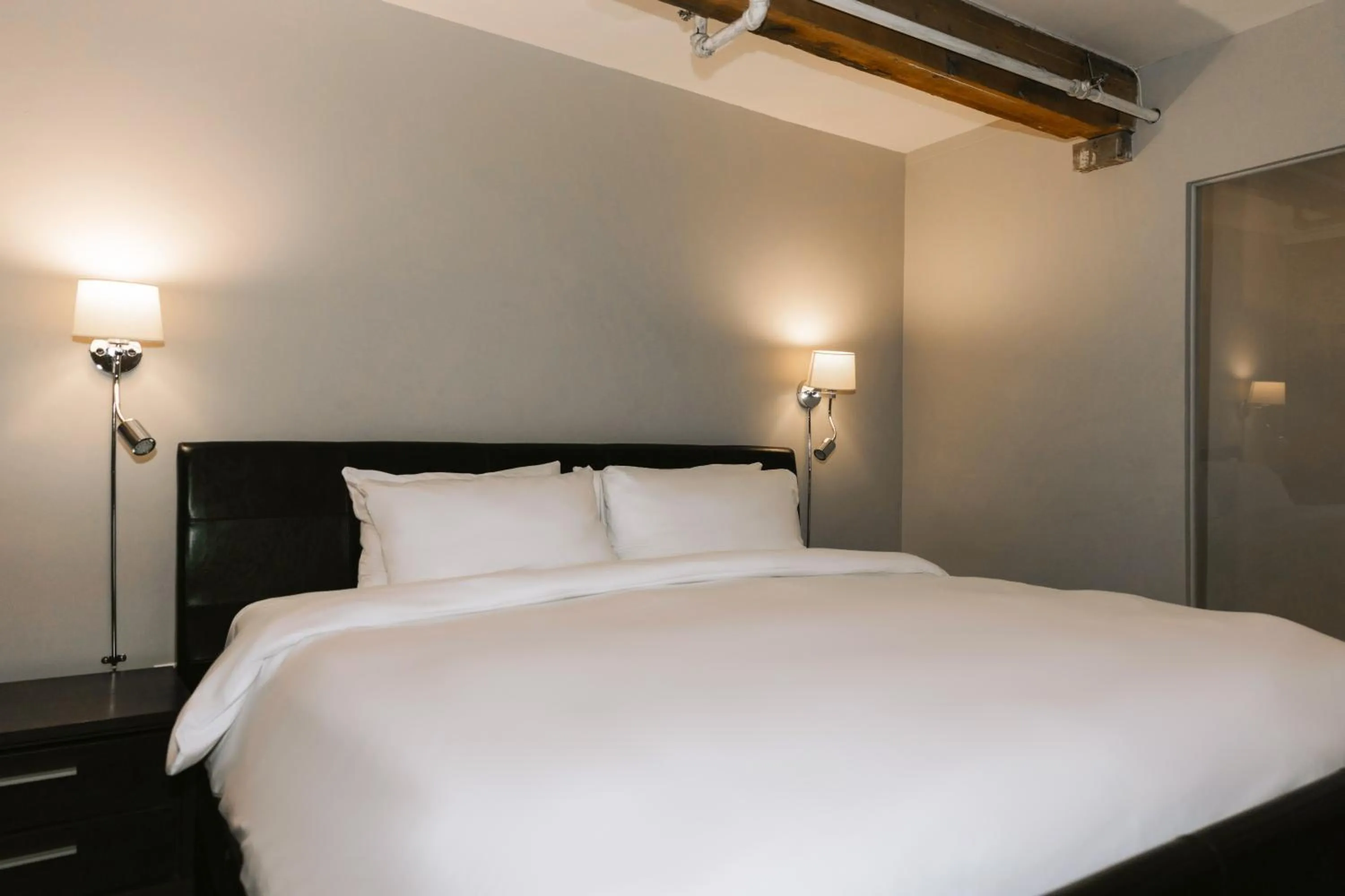 Bed in Lofts du Vieux-Port by Gray Collection