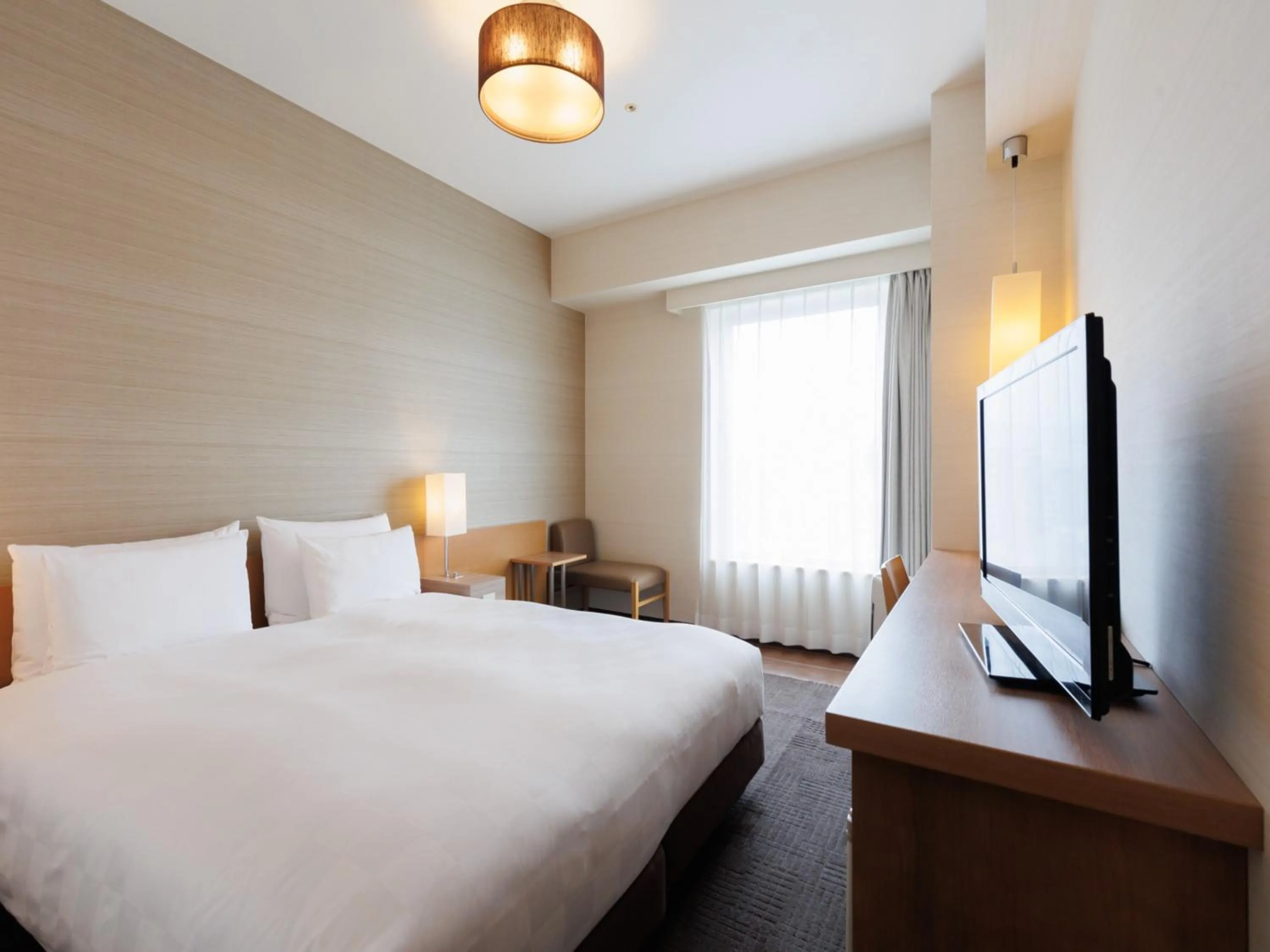 Photo of the whole room, Bed in Hotel Resol Trinity Hakata