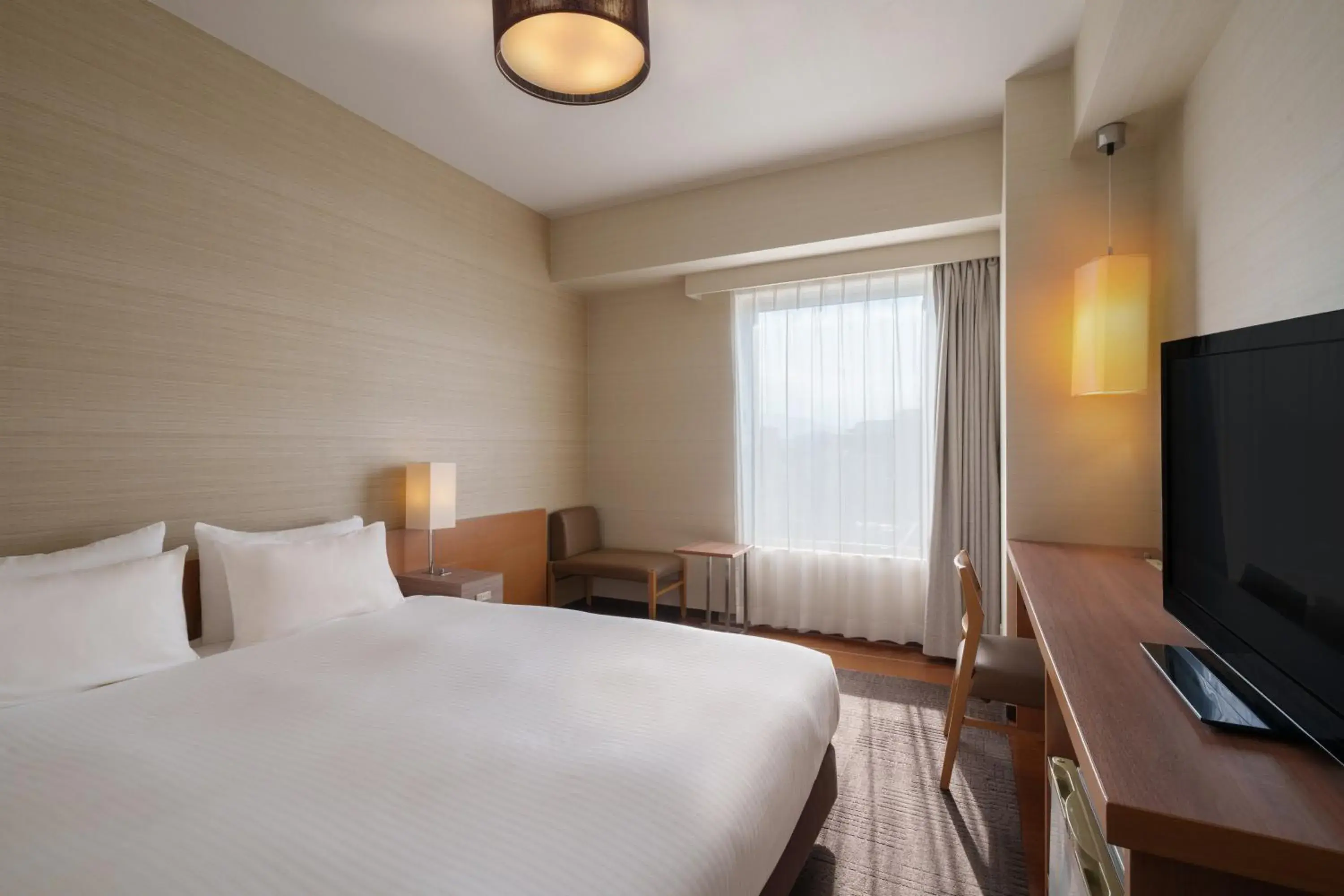 Photo of the whole room, Bed in Hotel Resol Trinity Hakata Photo of the whole room, Bed in Hotel Resol Trinity Hakata