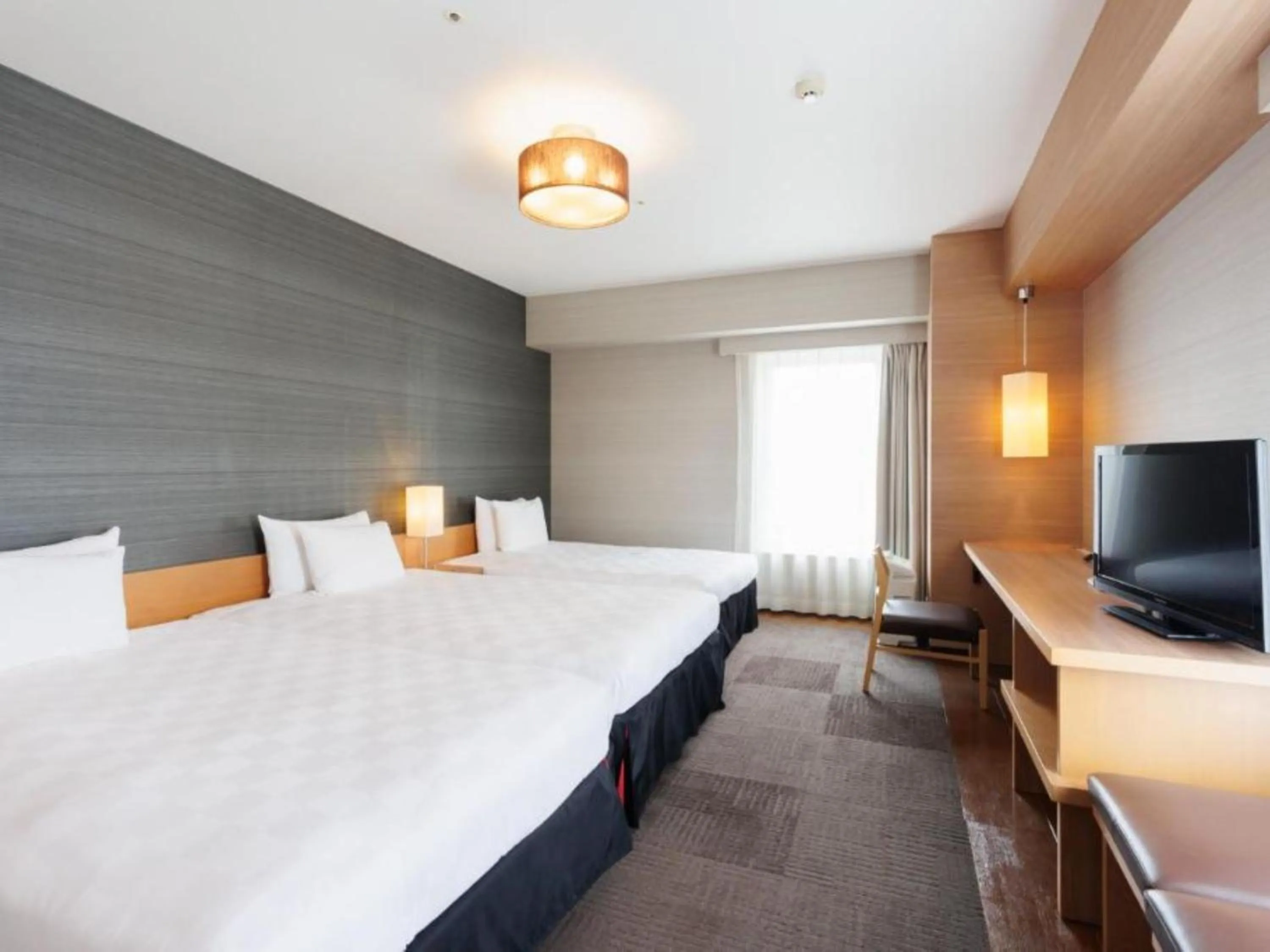 Photo of the whole room, Bed in Hotel Resol Trinity Hakata