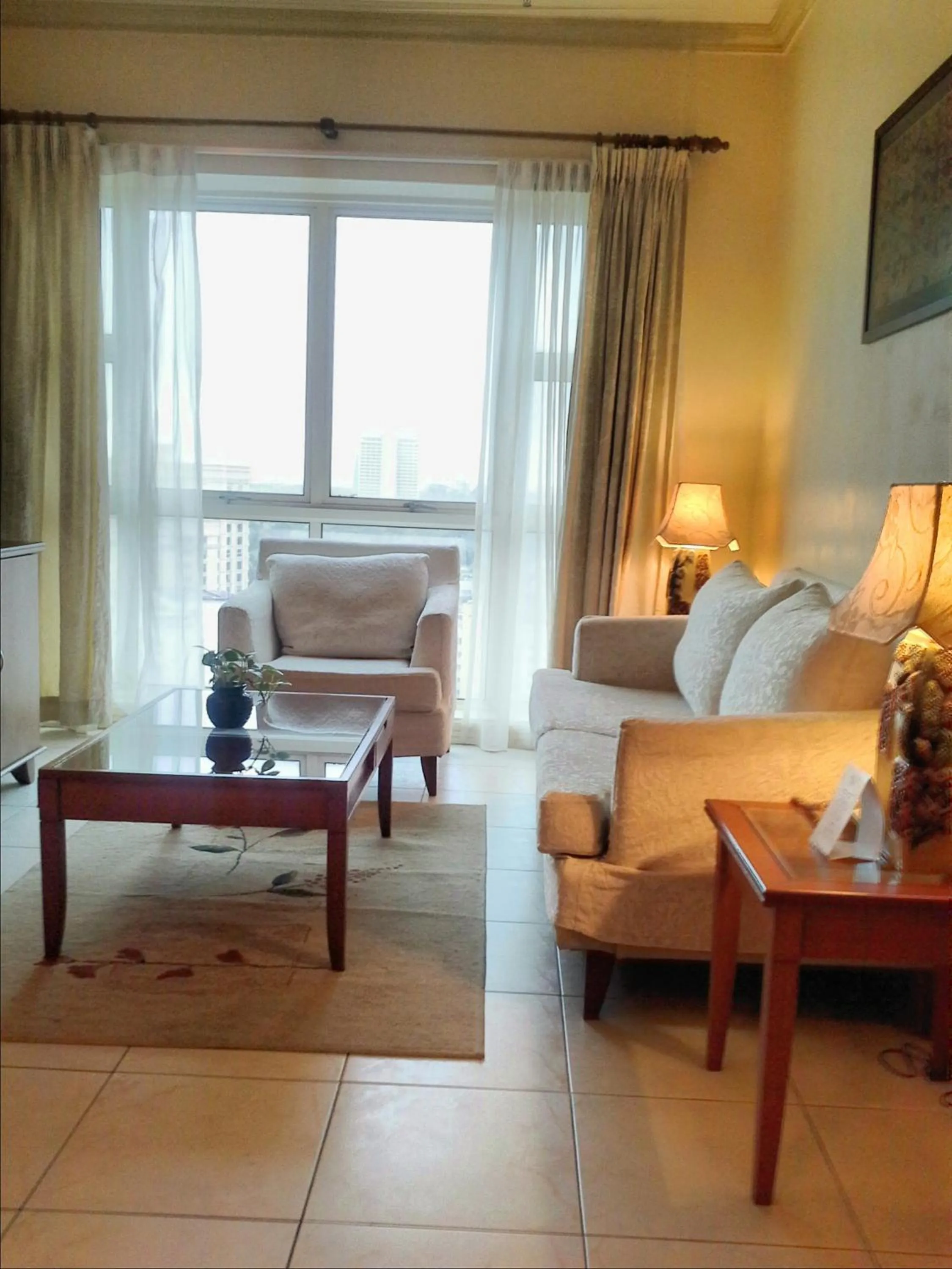 Living room in StayInn Gateway Hotel Apartment