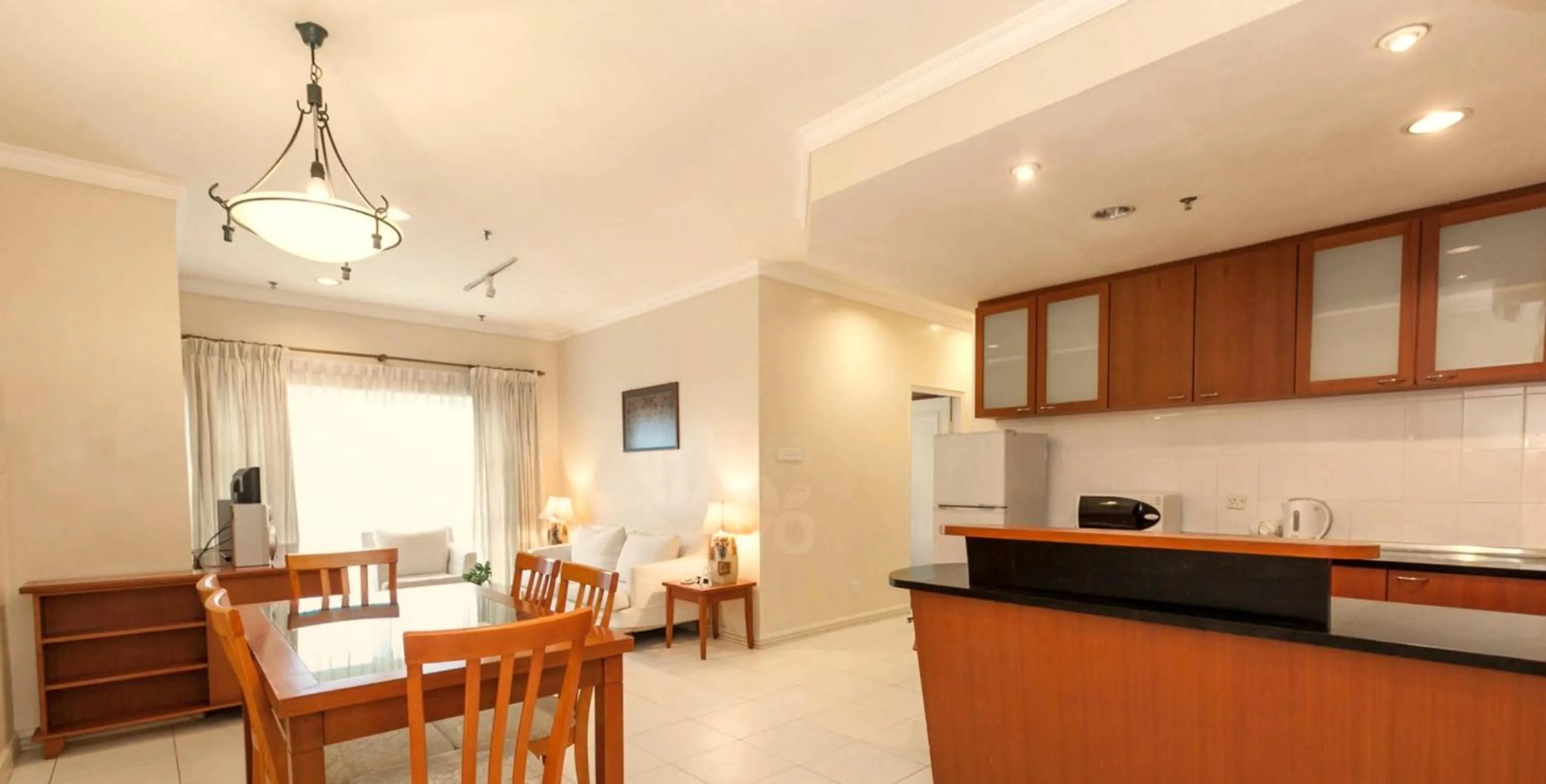 Kitchen or kitchenette in StayInn Gateway Hotel Apartment