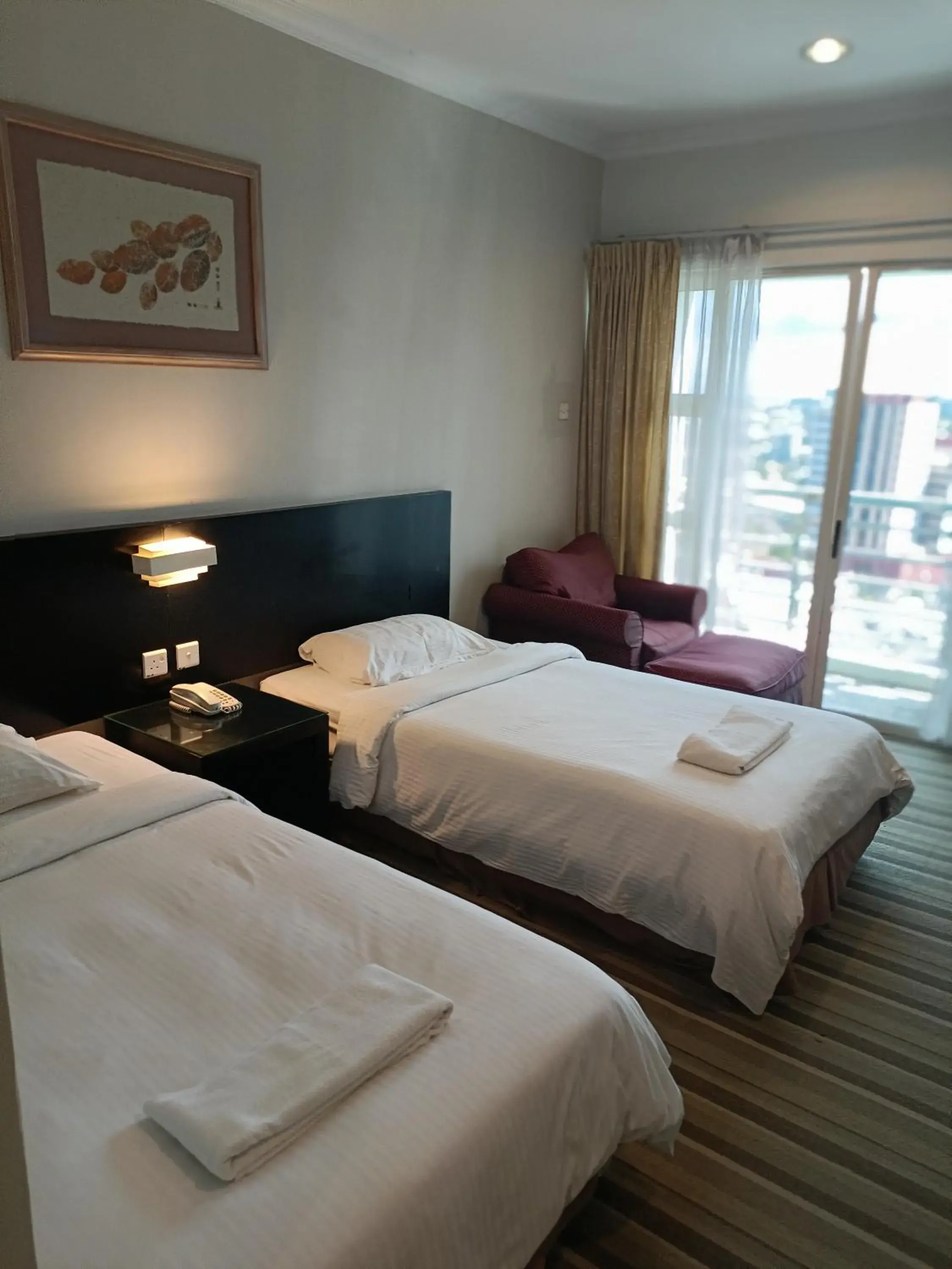 Bed in StayInn Gateway Hotel Apartment Bed in StayInn Gateway Hotel Apartment