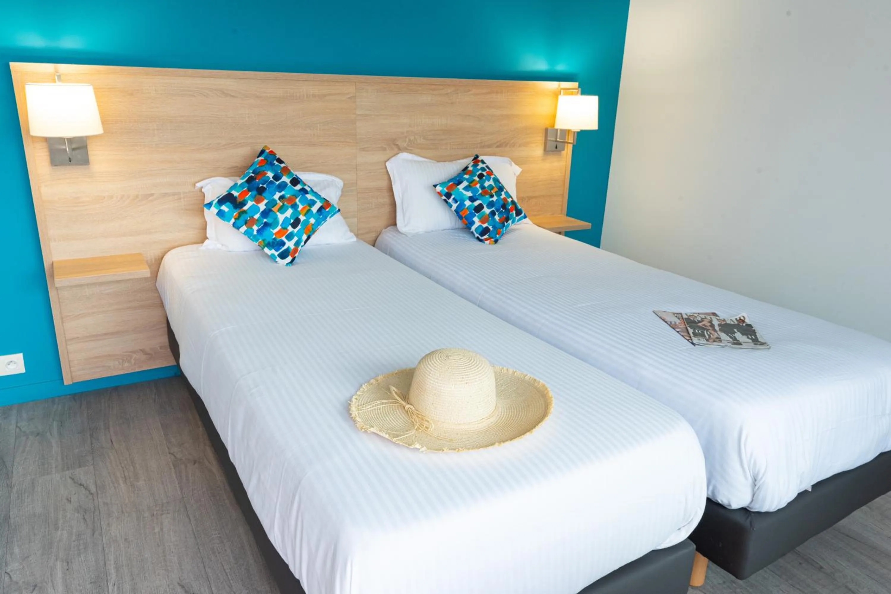 Bed in Zenitude Hôtel-Résidences Le Cannet