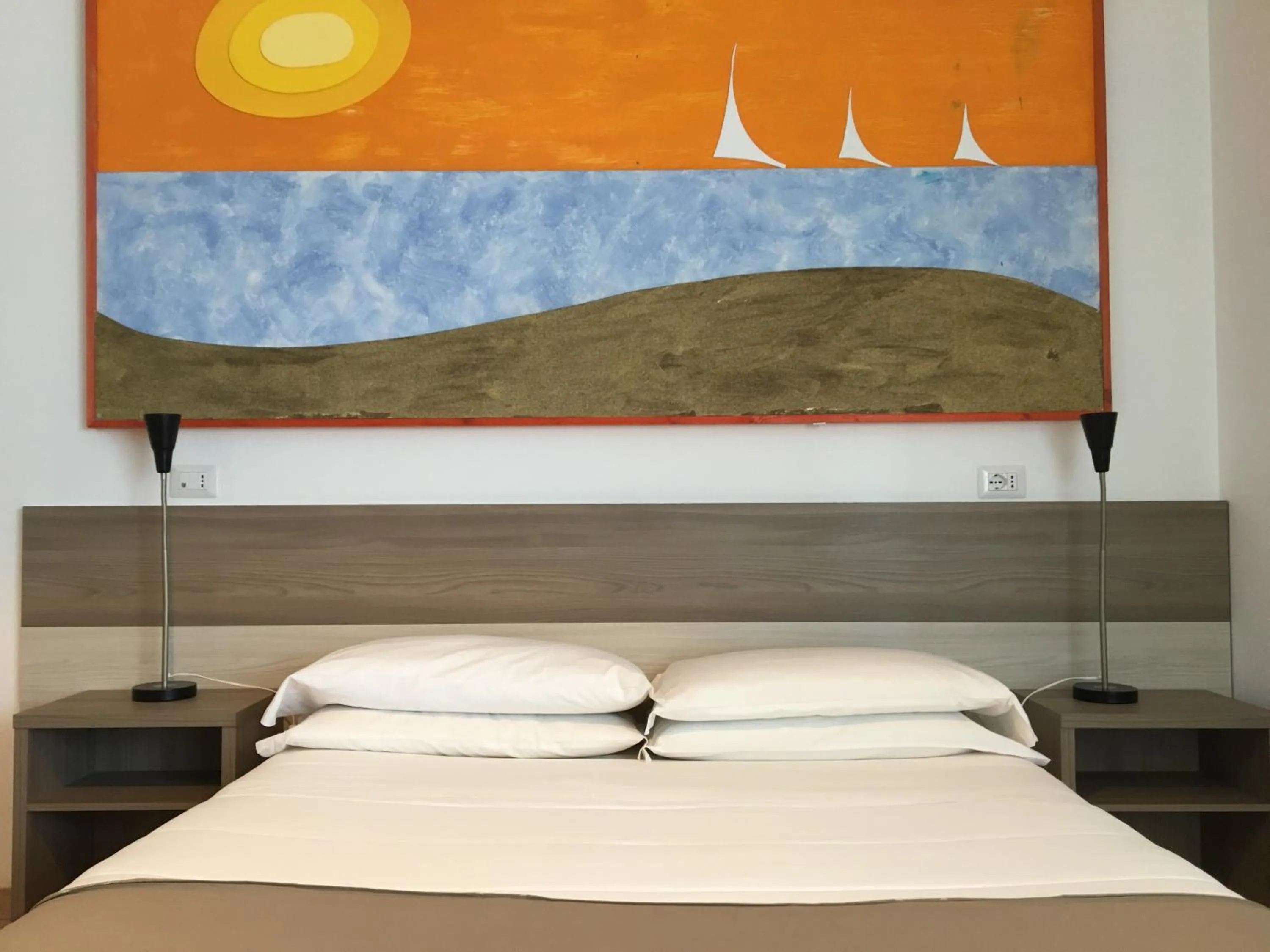 Bed in Hotel Corallo