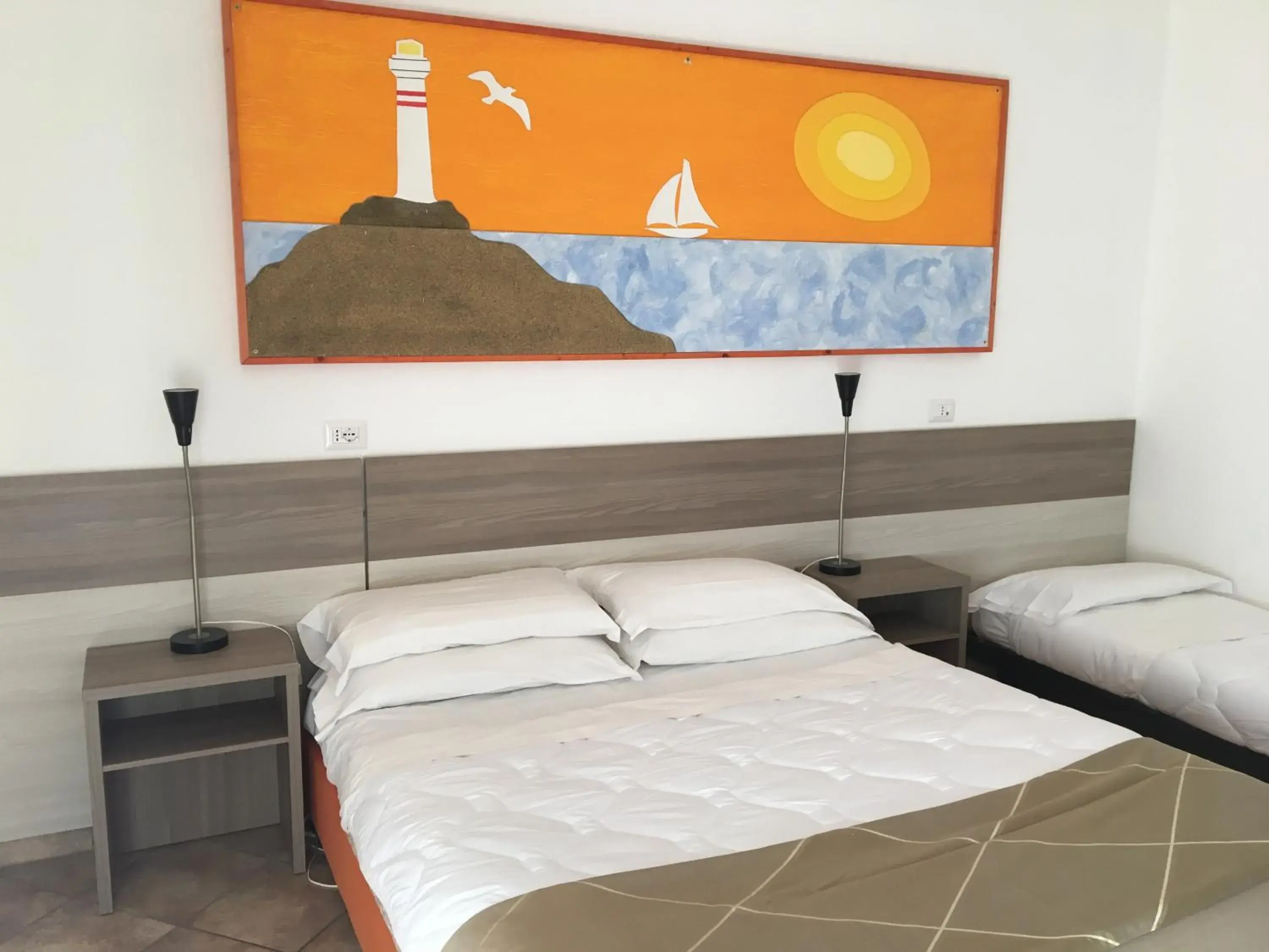 Quadruple Room in Hotel Corallo Quadruple Room in Hotel Corallo