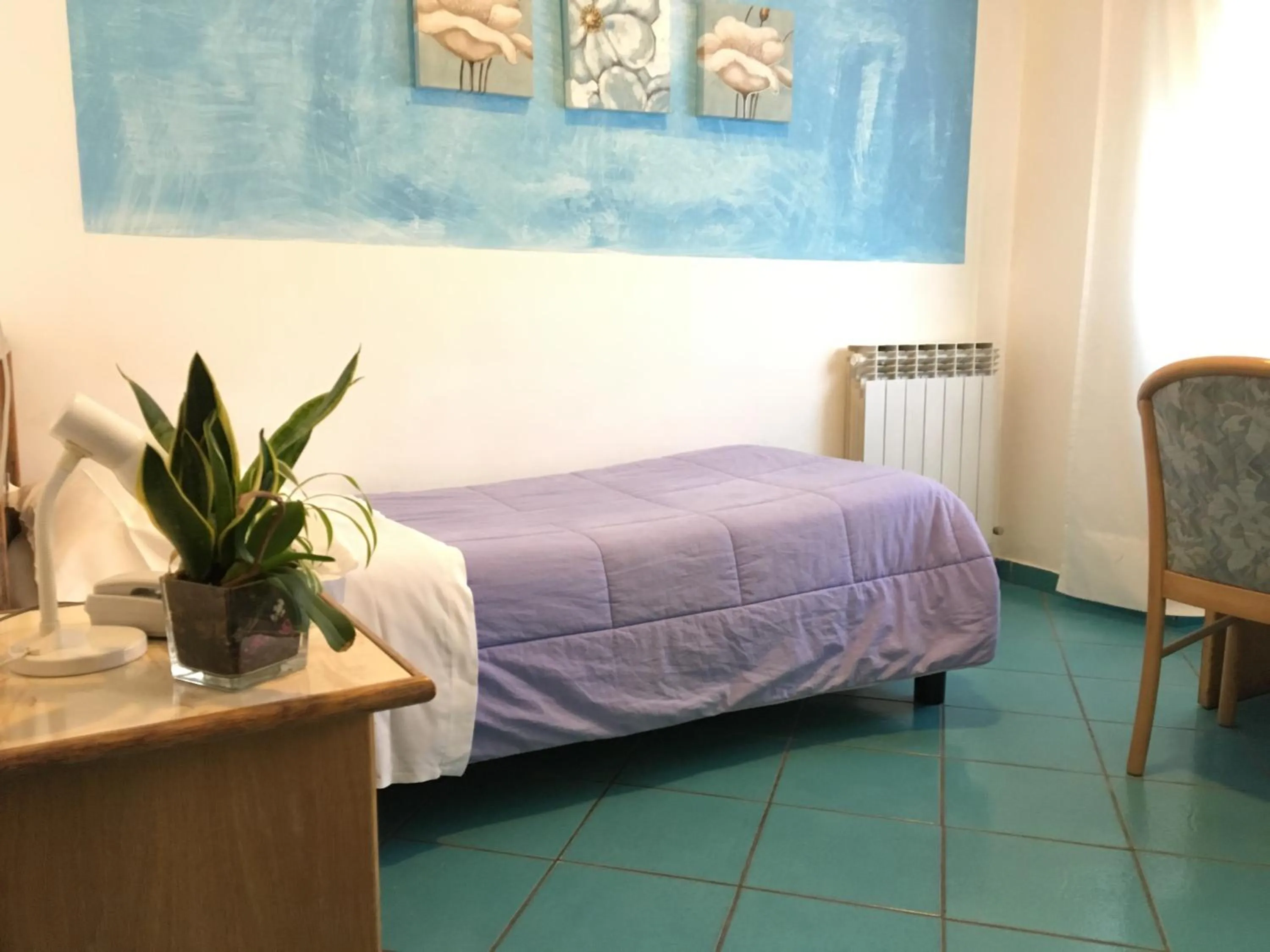 Bedroom in Hotel Corallo