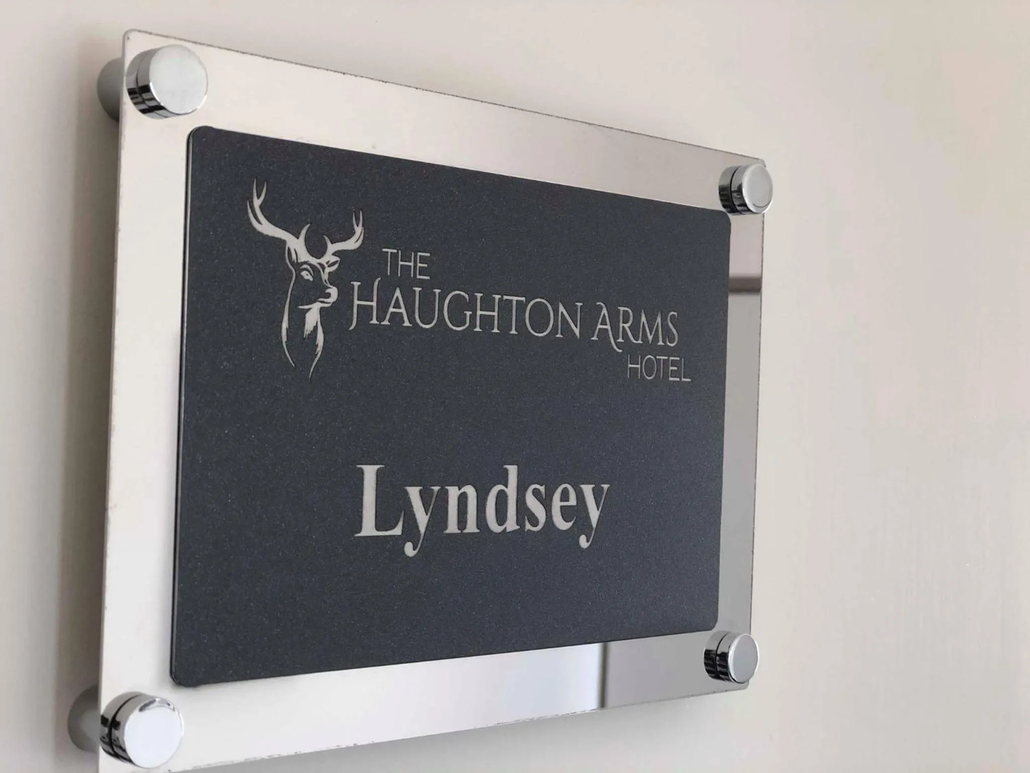 Property logo or sign in Haughton Arms Hotel