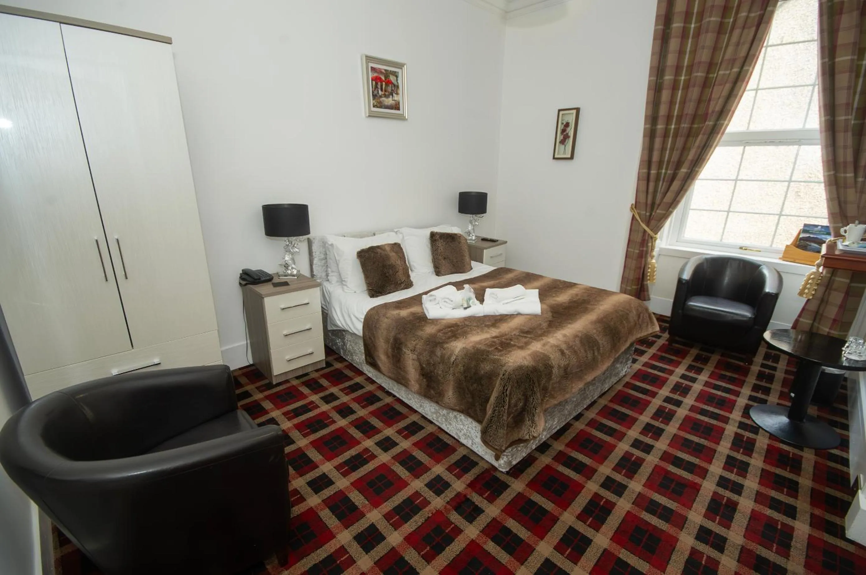 Photo of the whole room, Bed in Haughton Arms Hotel