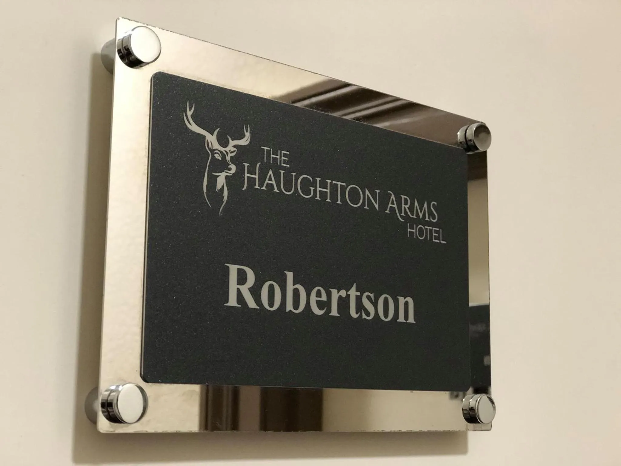 Property logo or sign in Haughton Arms Hotel