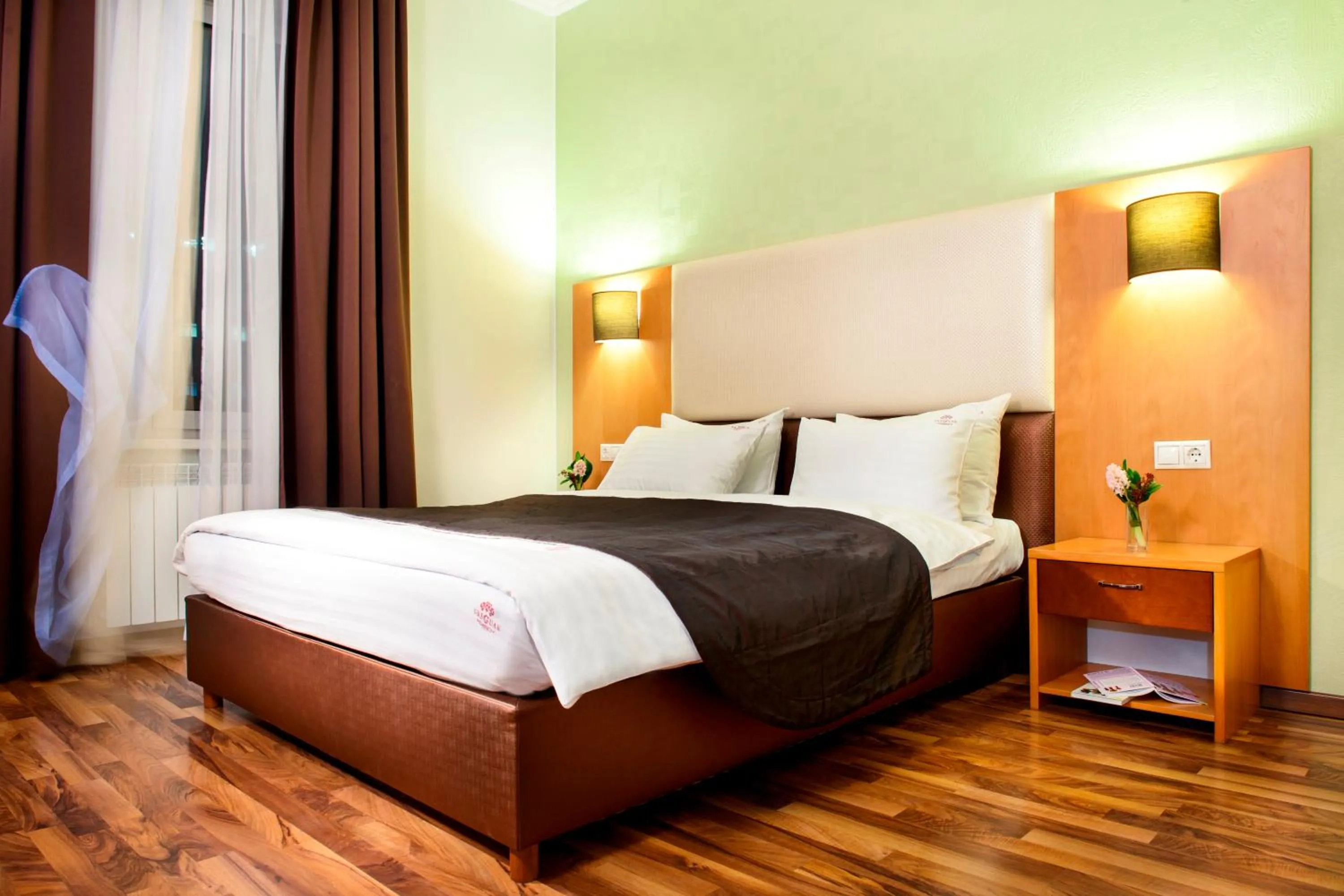 Photo of the whole room, Bed in Greguar Hotel by UHM