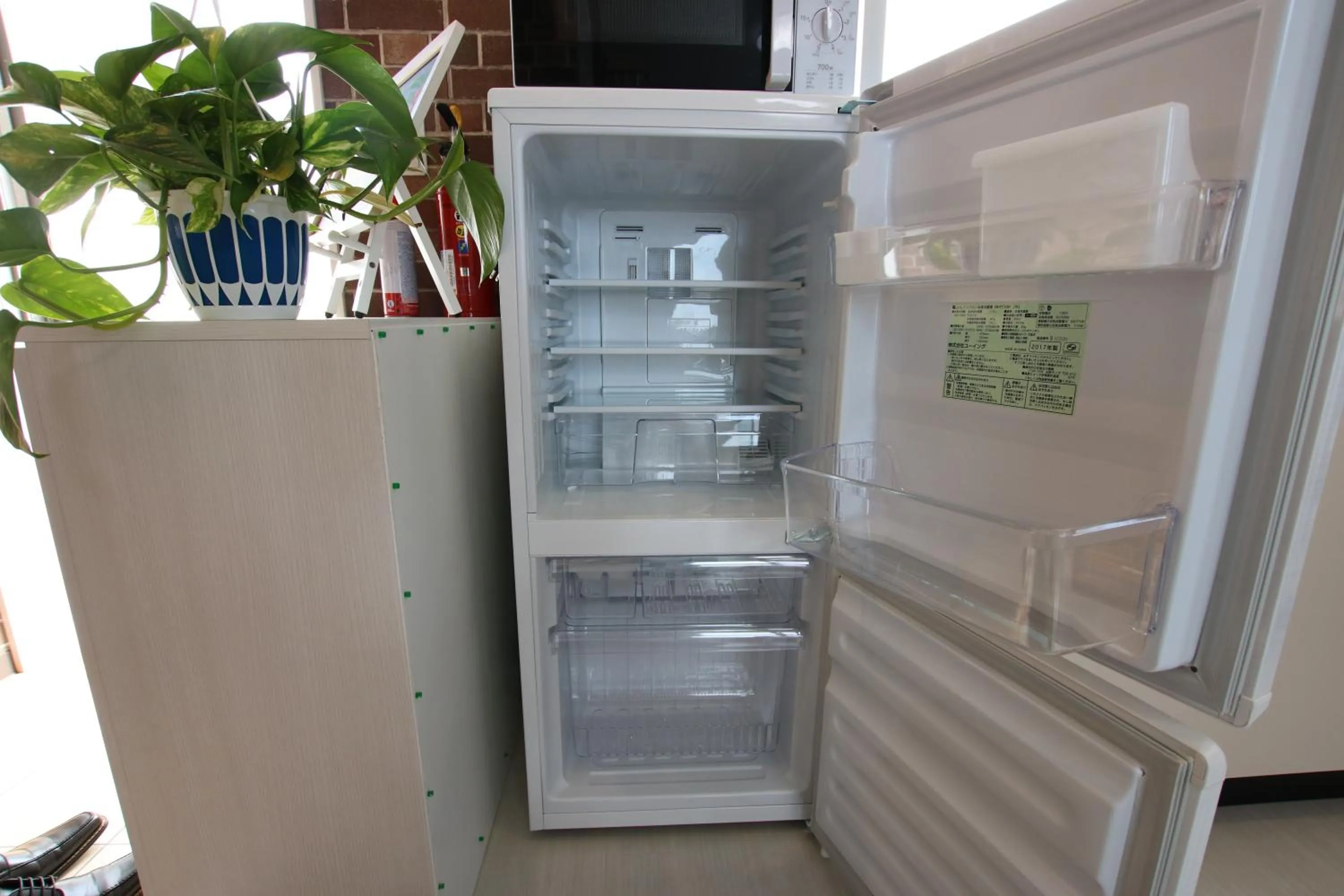 Kitchen or kitchenette in guesthouse yu -SEVEN Hotels and Resorts-