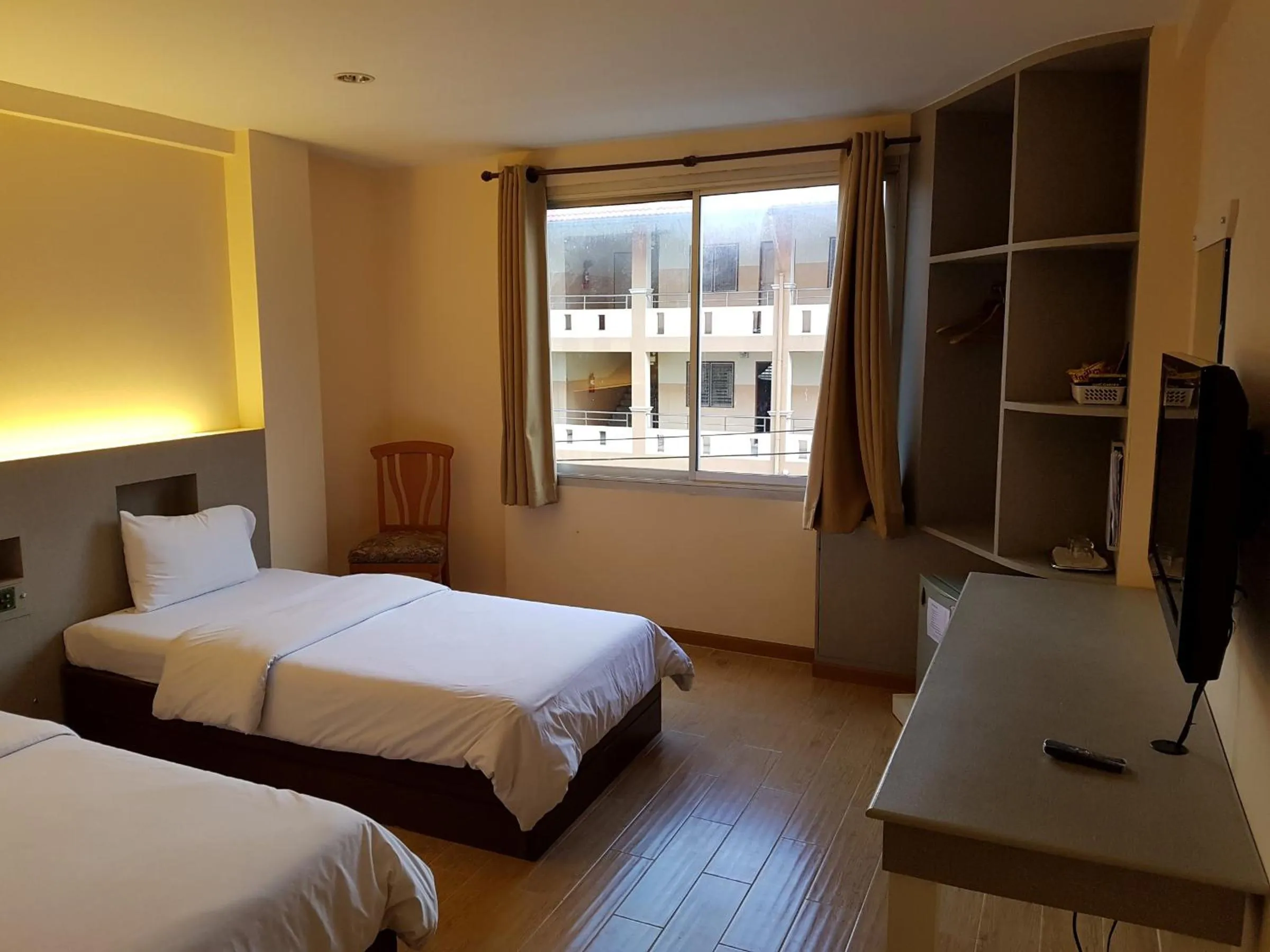 Bed in K.S.Pavilion Hotel