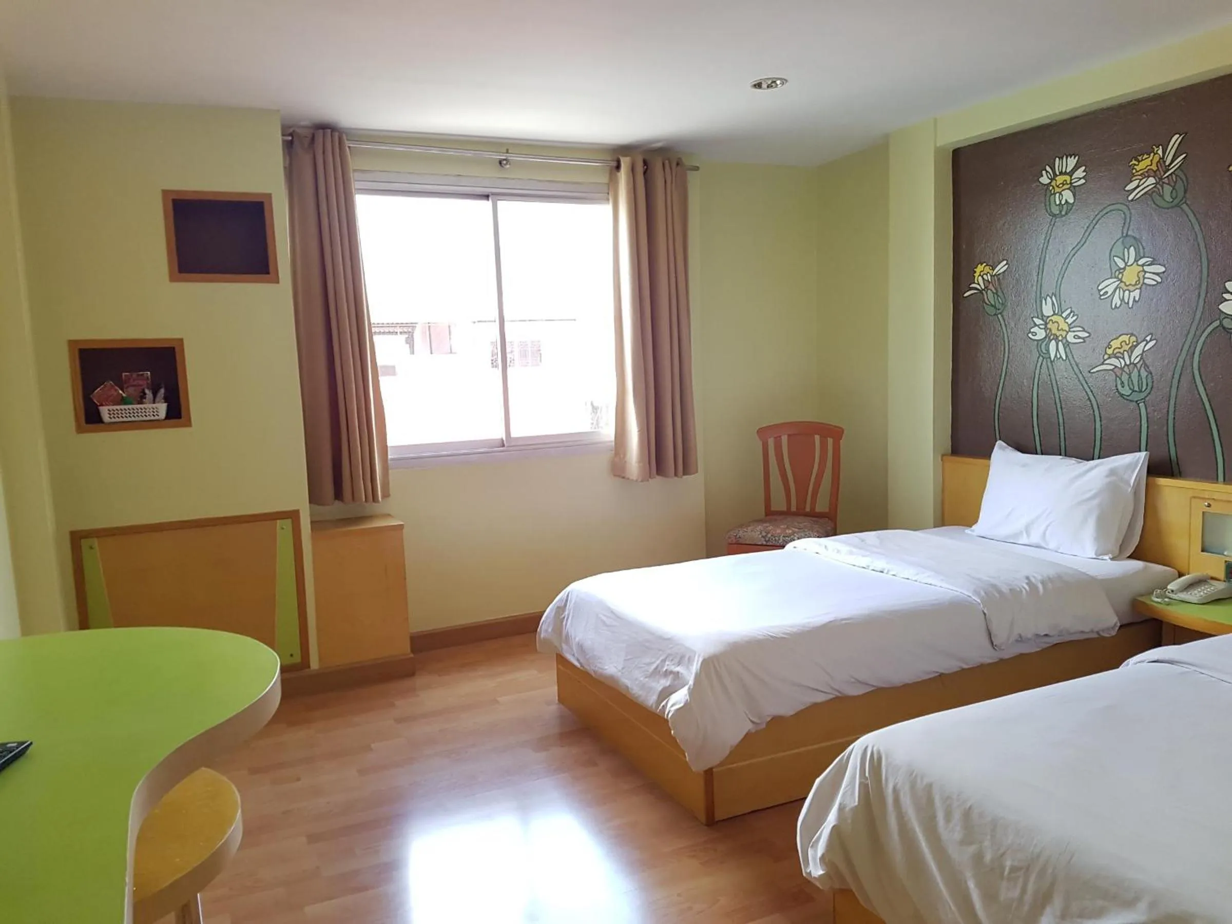 Bed in K.S.Pavilion Hotel