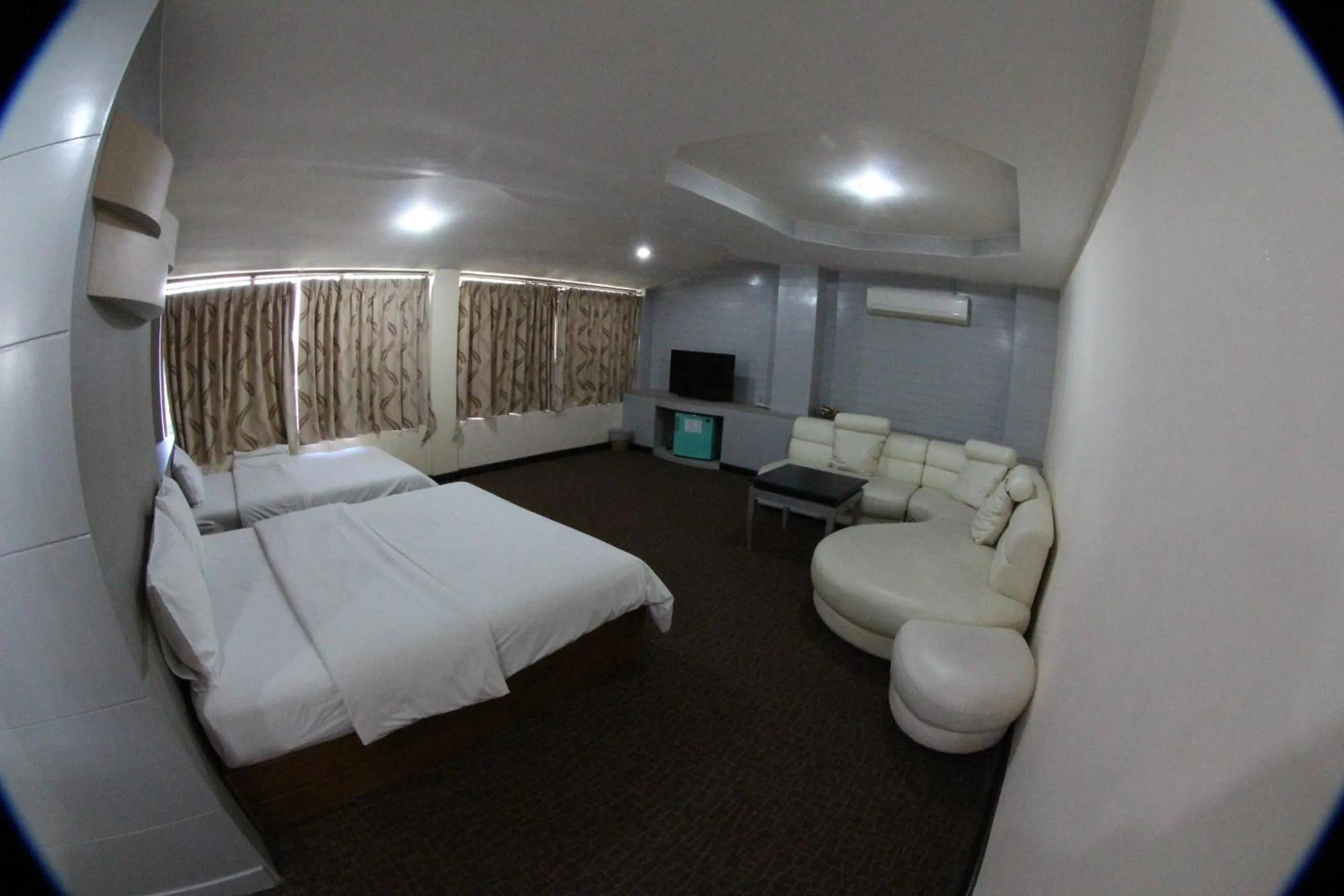 Bed in K.S.Pavilion Hotel
