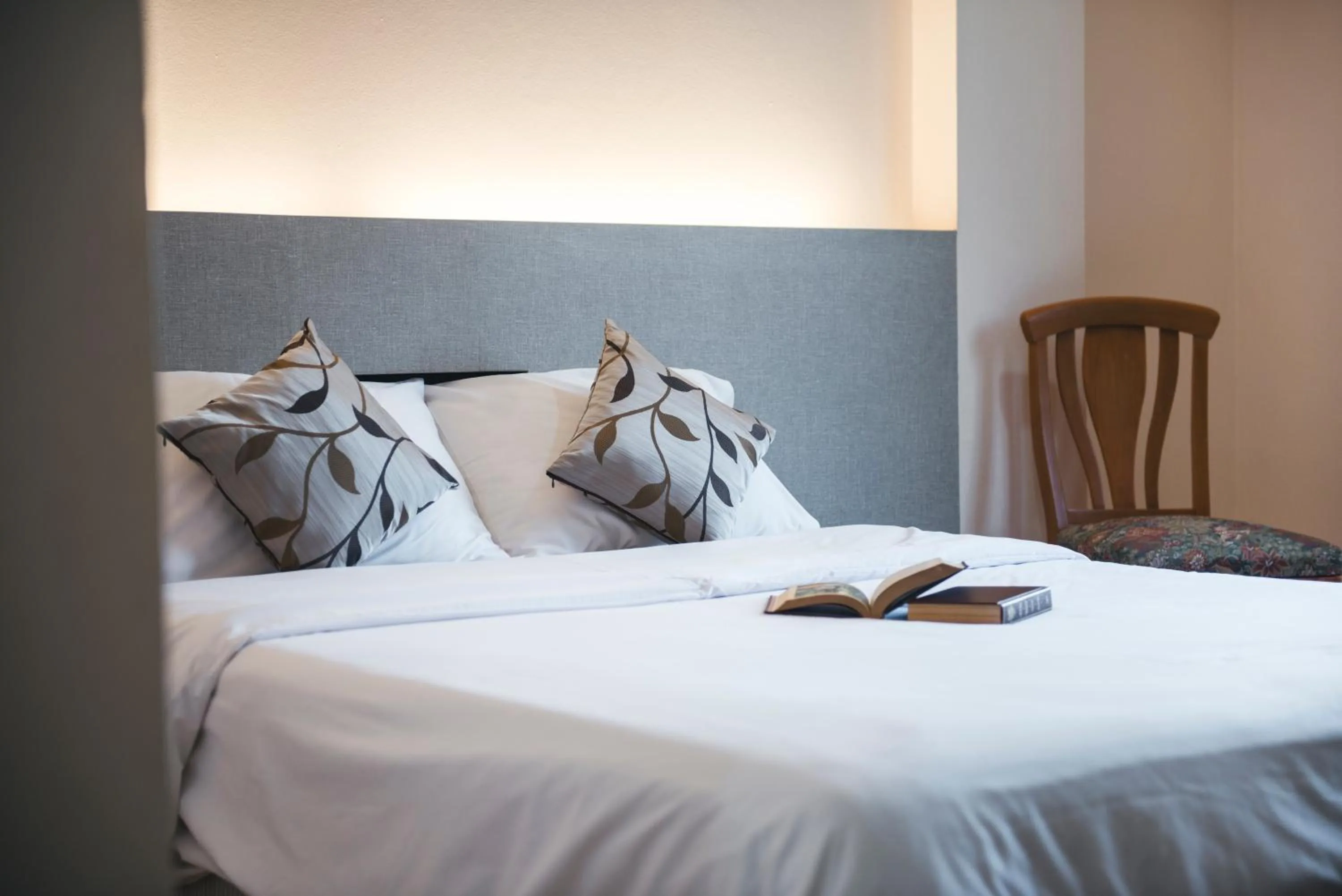 Bed in K.S.Pavilion Hotel