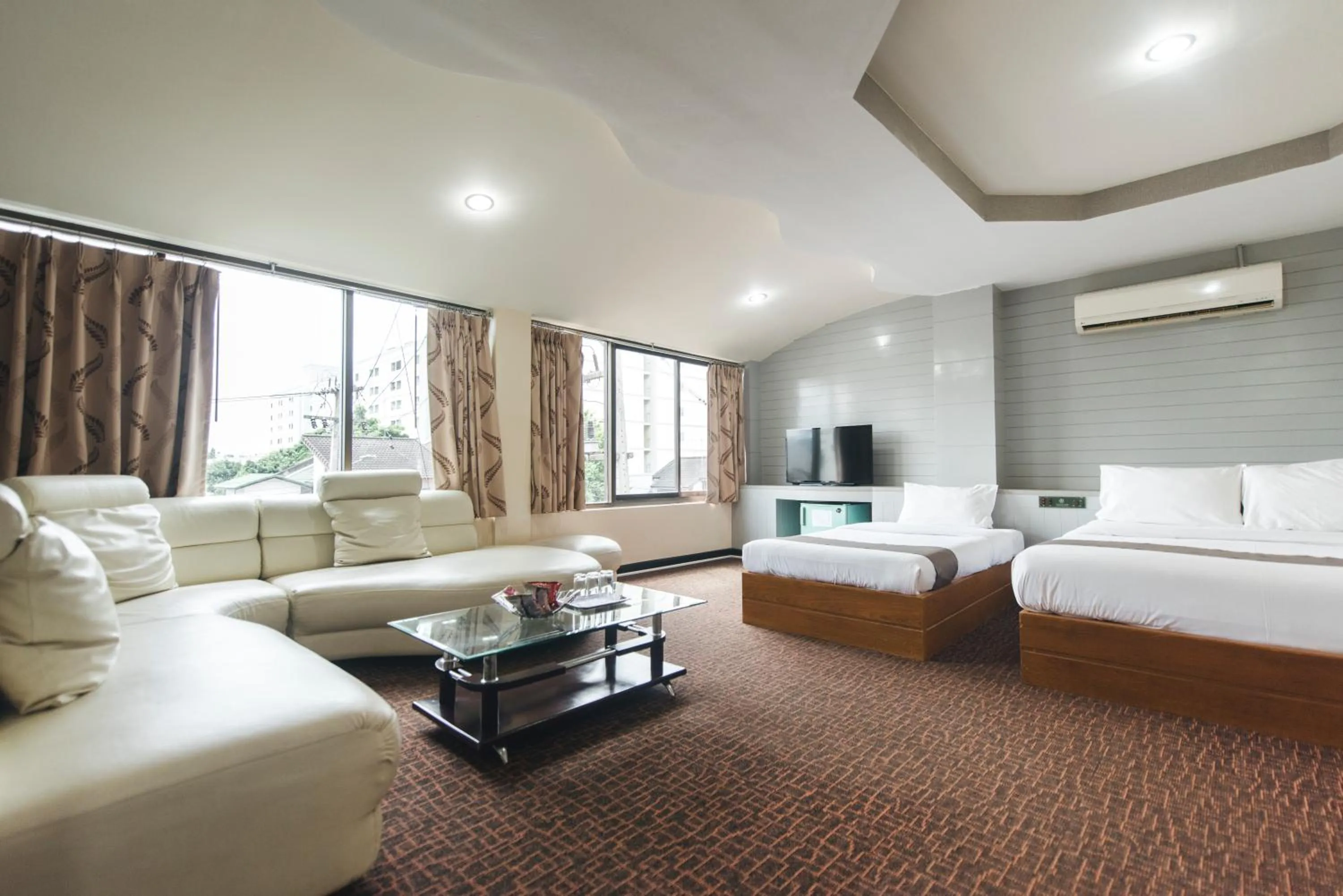 Bed in K.S.Pavilion Hotel