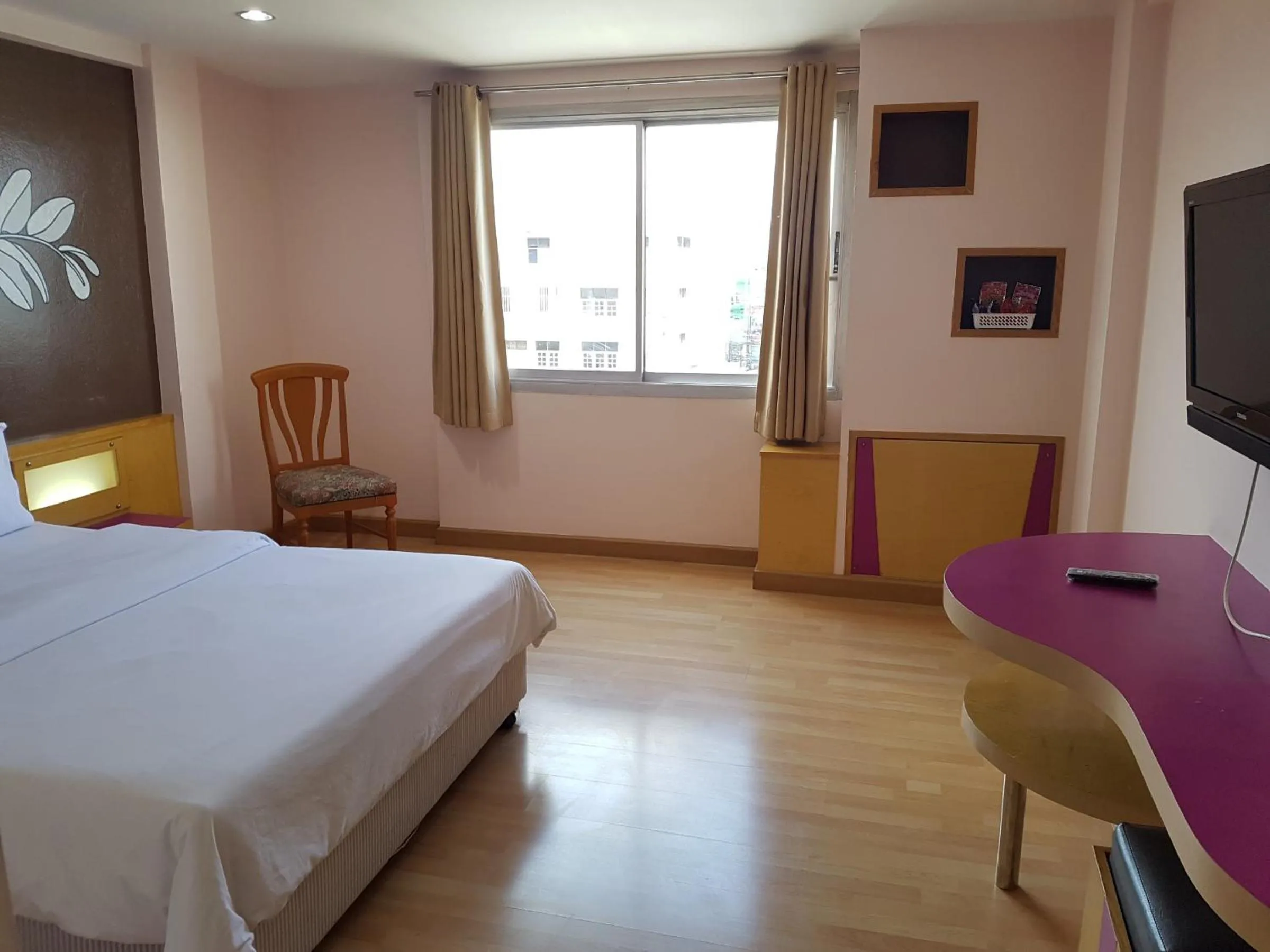 Bed in K.S.Pavilion Hotel