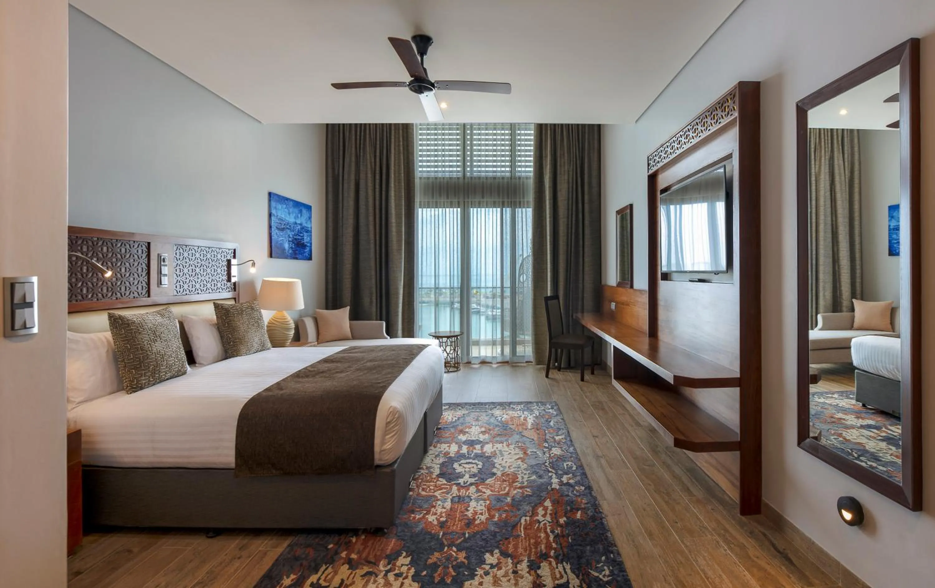 TV and multimedia, Bed in Hotel Verde Zanzibar - Azam Luxury Resort and Spa - Dry Hotel