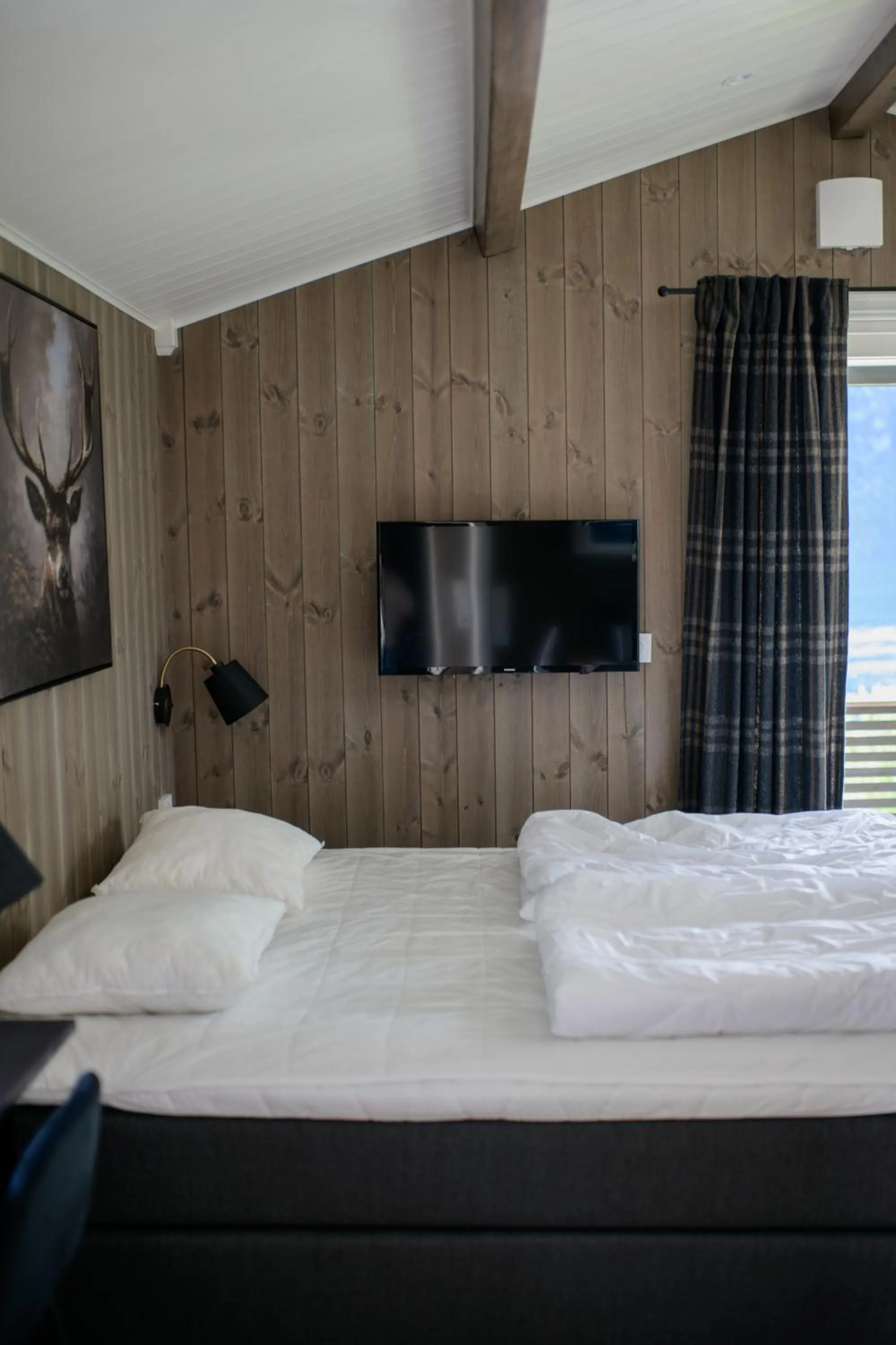 Bed in Grande Hytteutleige og Camping