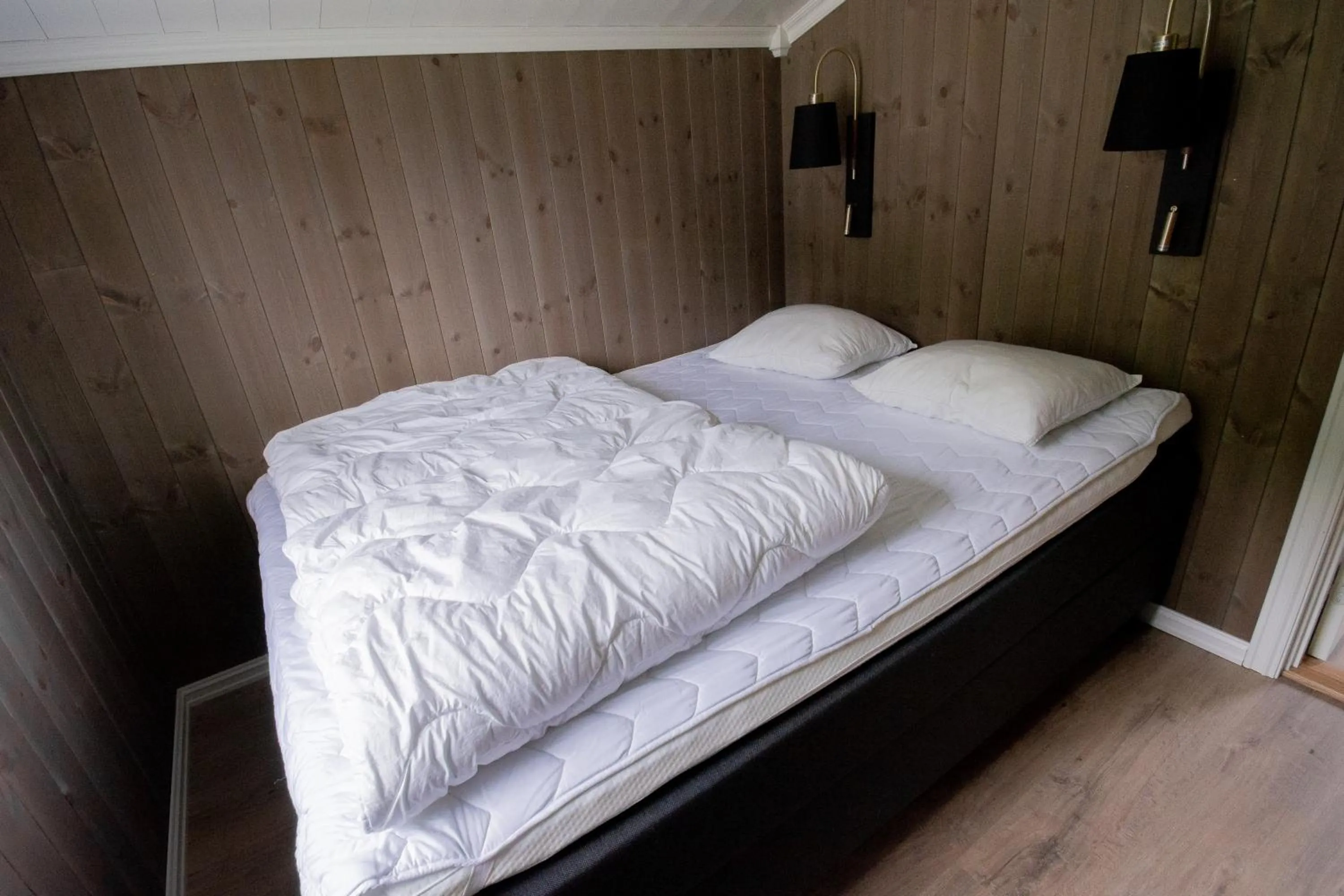 Bed in Grande Hytteutleige og Camping