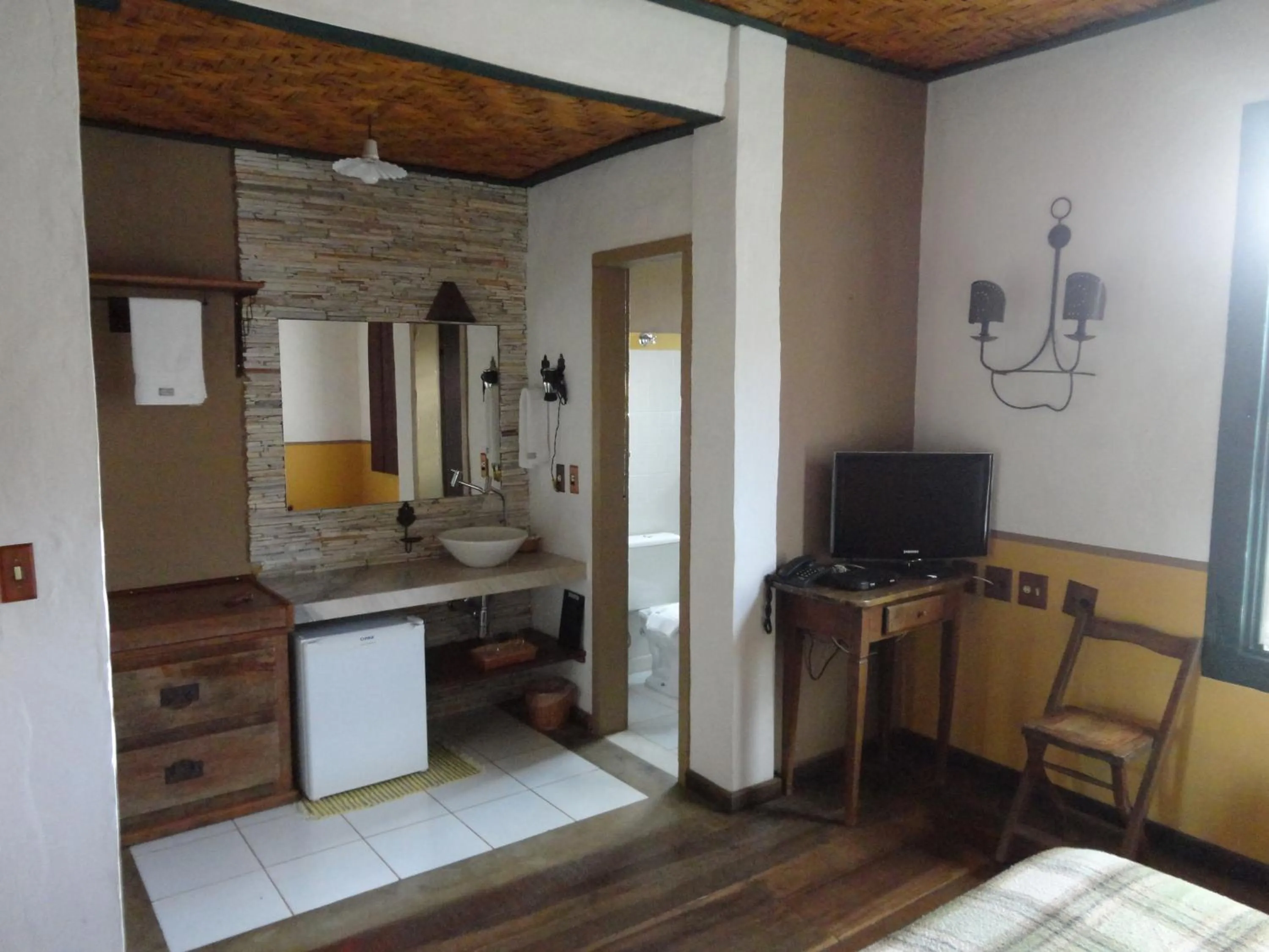 Bedroom in Pousada d'Oleo de Guignard