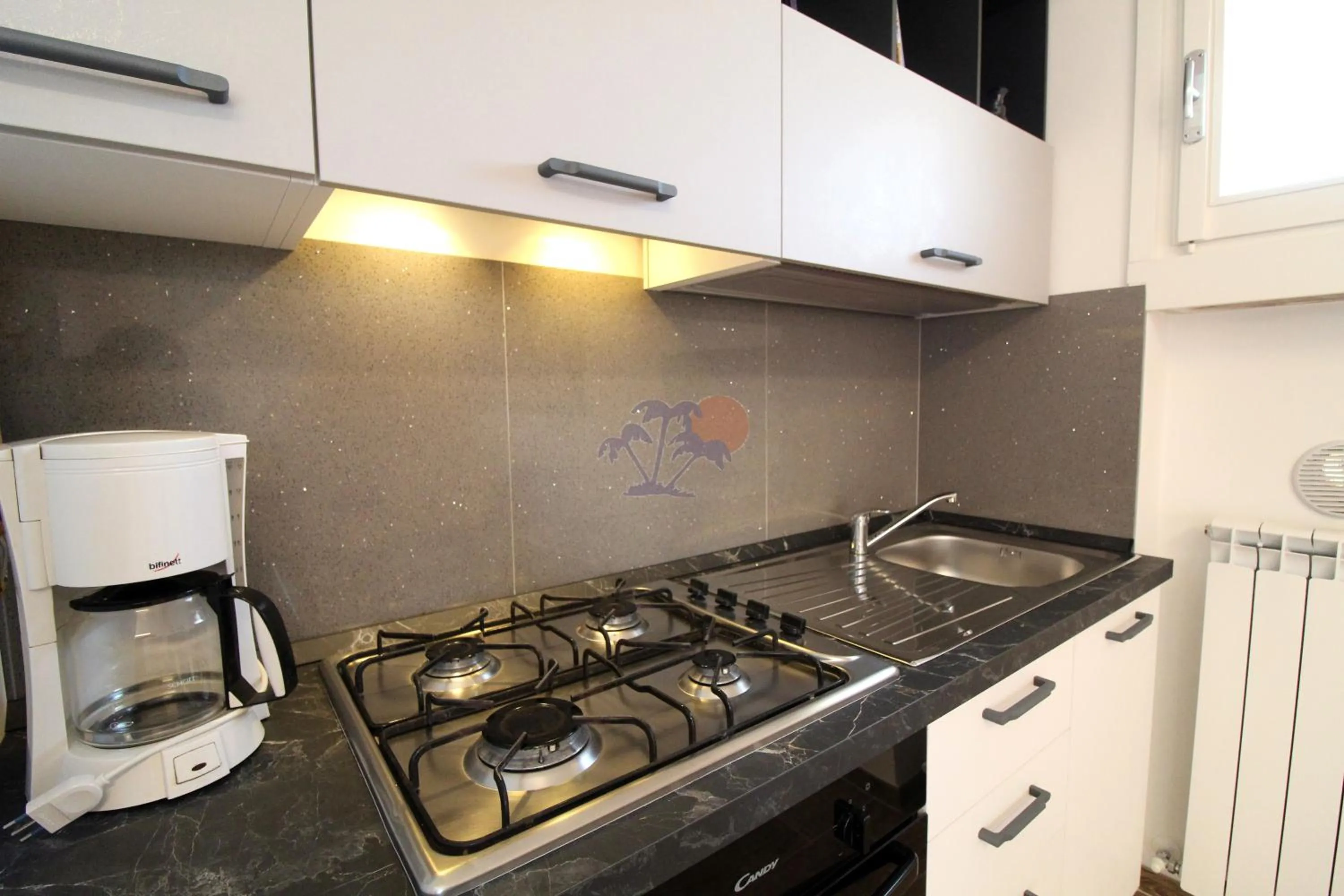 Kitchen or kitchenette in Appartamenti La Madonnina