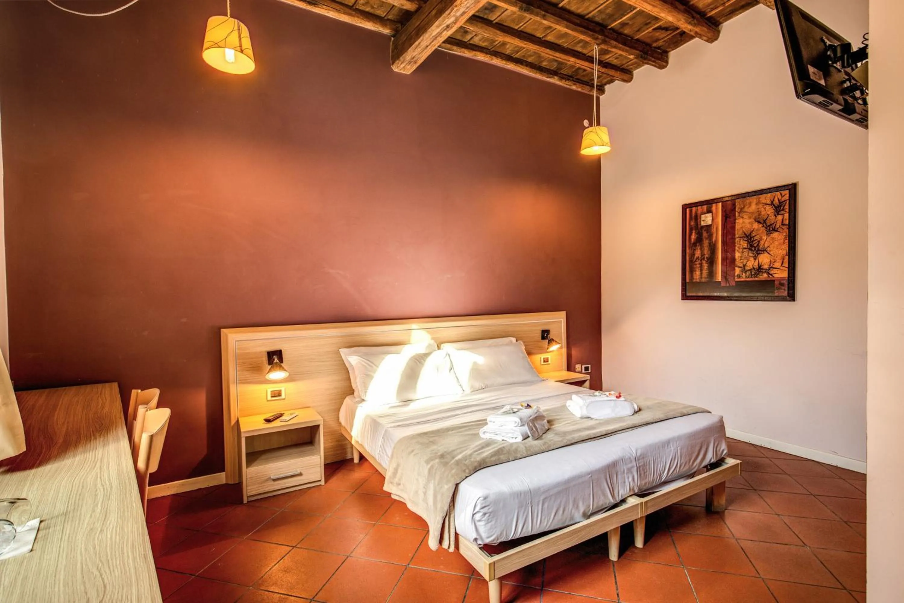 Bed in Guest House o Affittacamere Magenta Fico 2