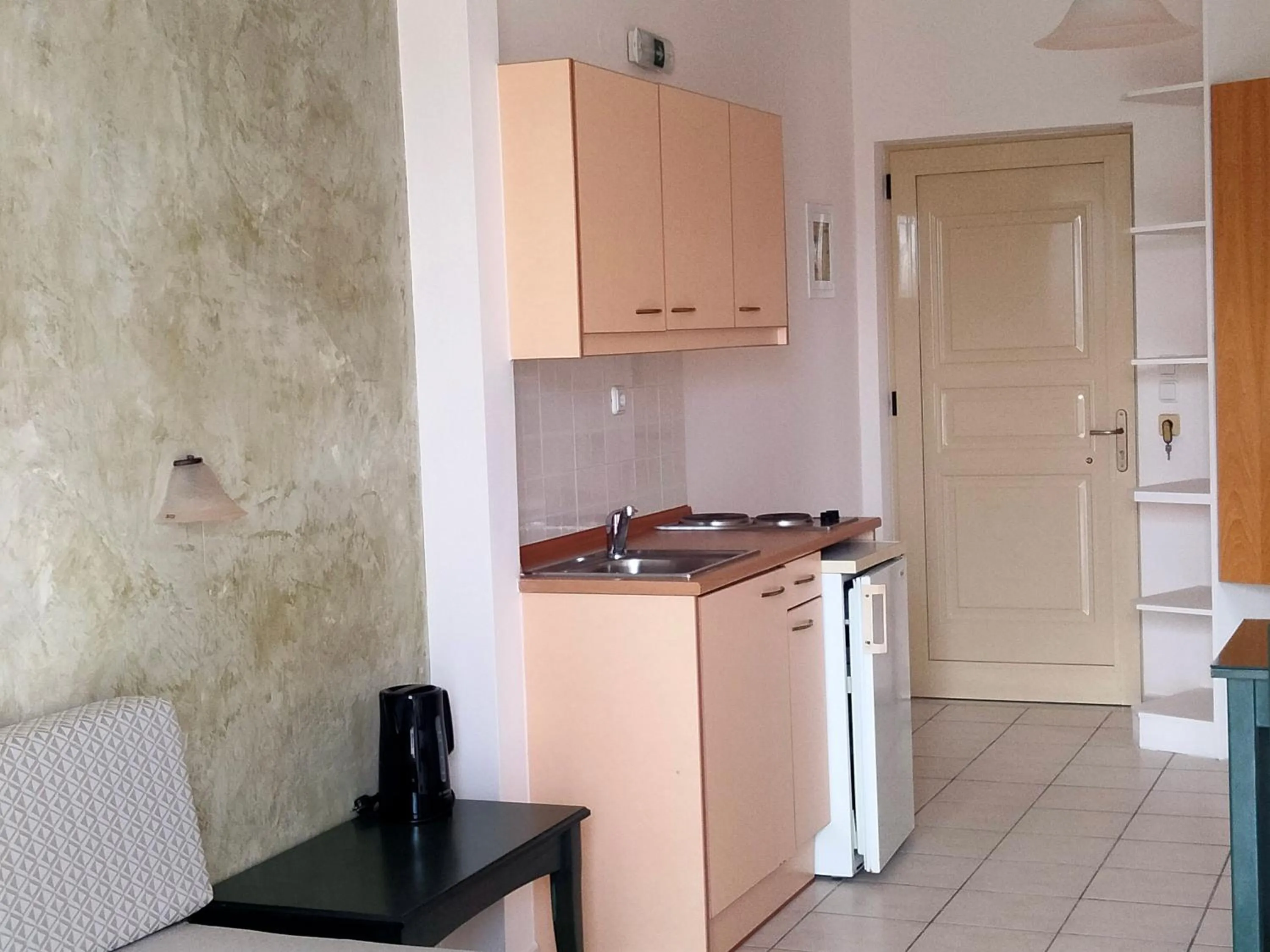 Kitchen or kitchenette in Zannis Hotel