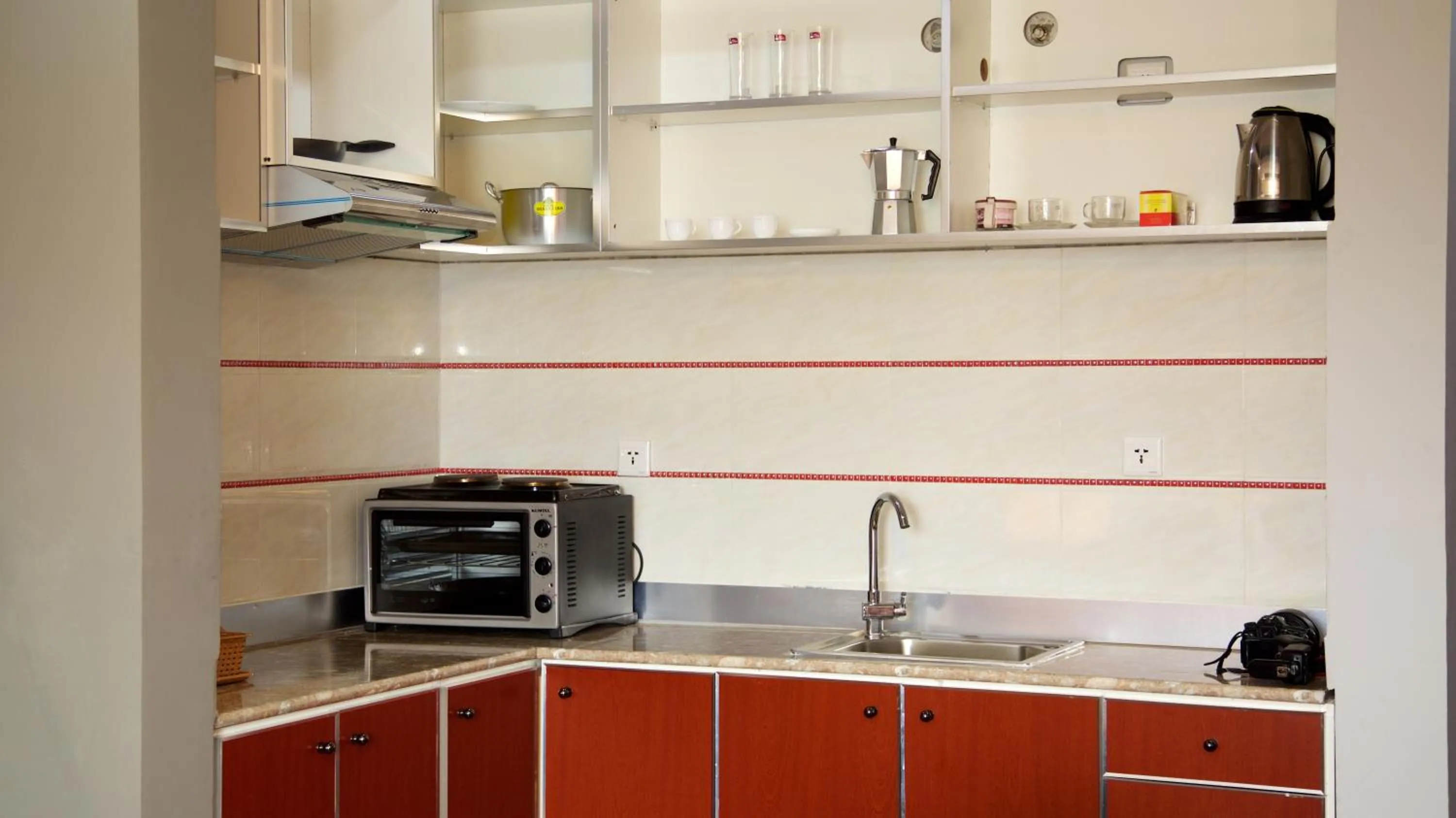 Kitchen or kitchenette in Yinm Furnished Apartment