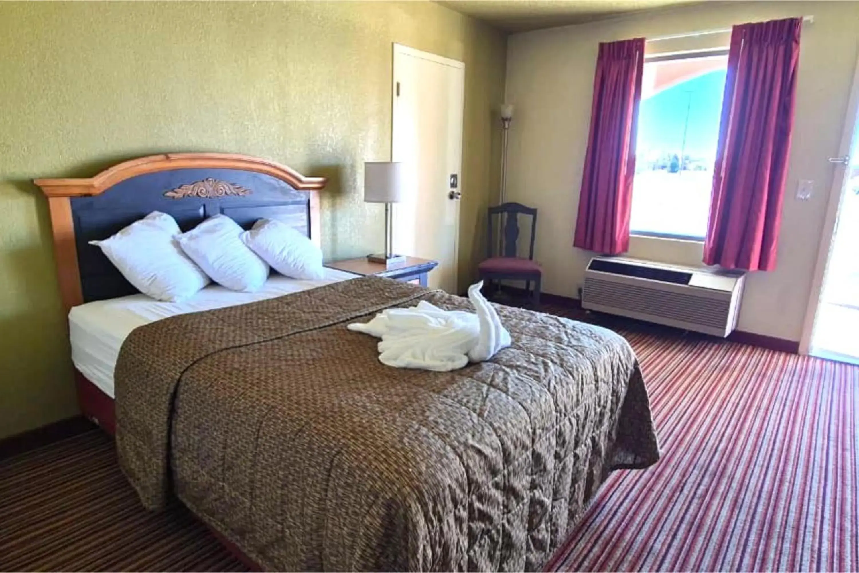 Bedroom, Bed in Suite Dreams Motel By Capital O Mattoon I - 57 Bedroom, Bed in Suite Dreams Motel By Capital O Mattoon I - 57