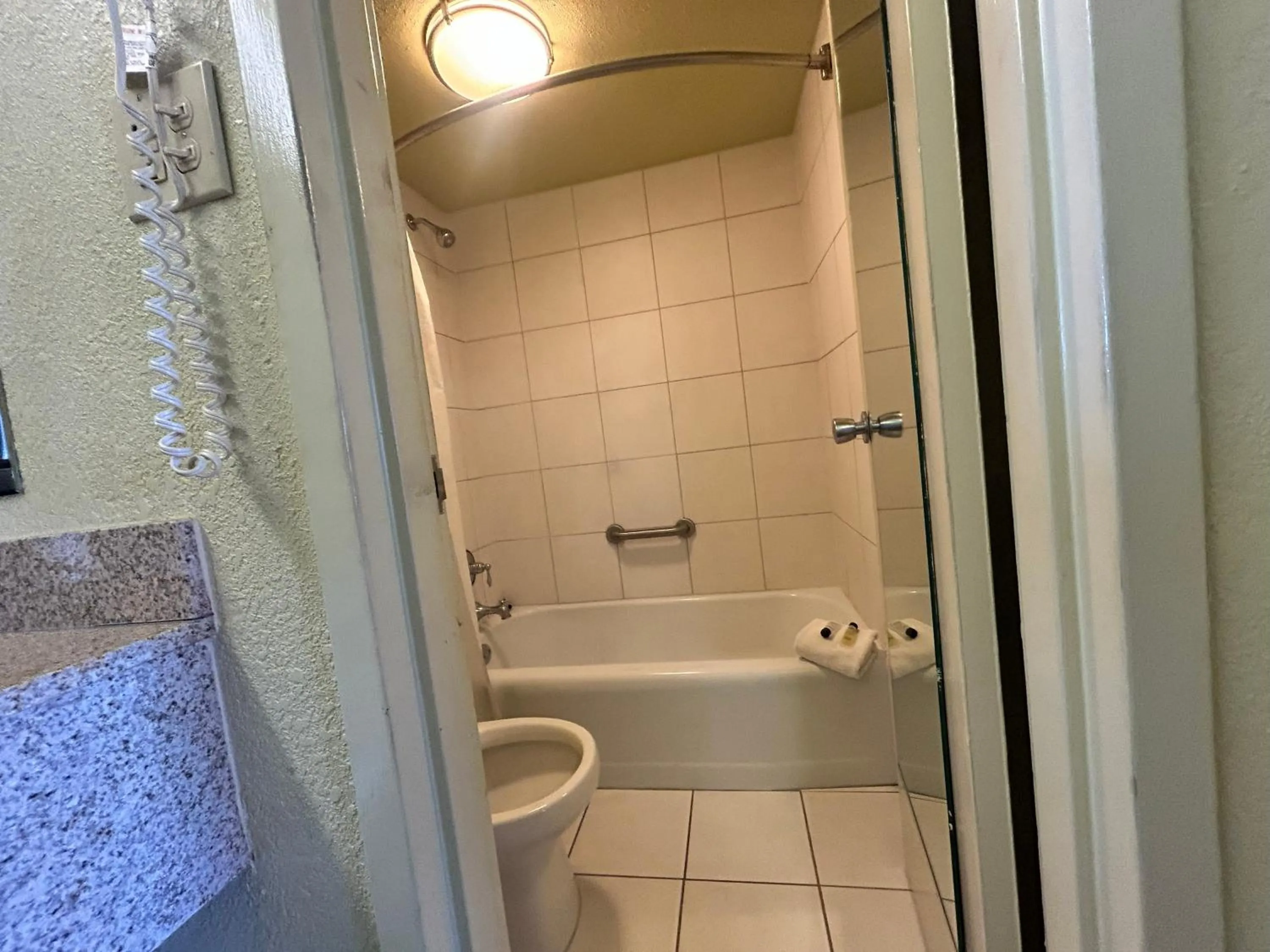 Bathroom in Suite Dreams Motel By Capital O Mattoon I - 57