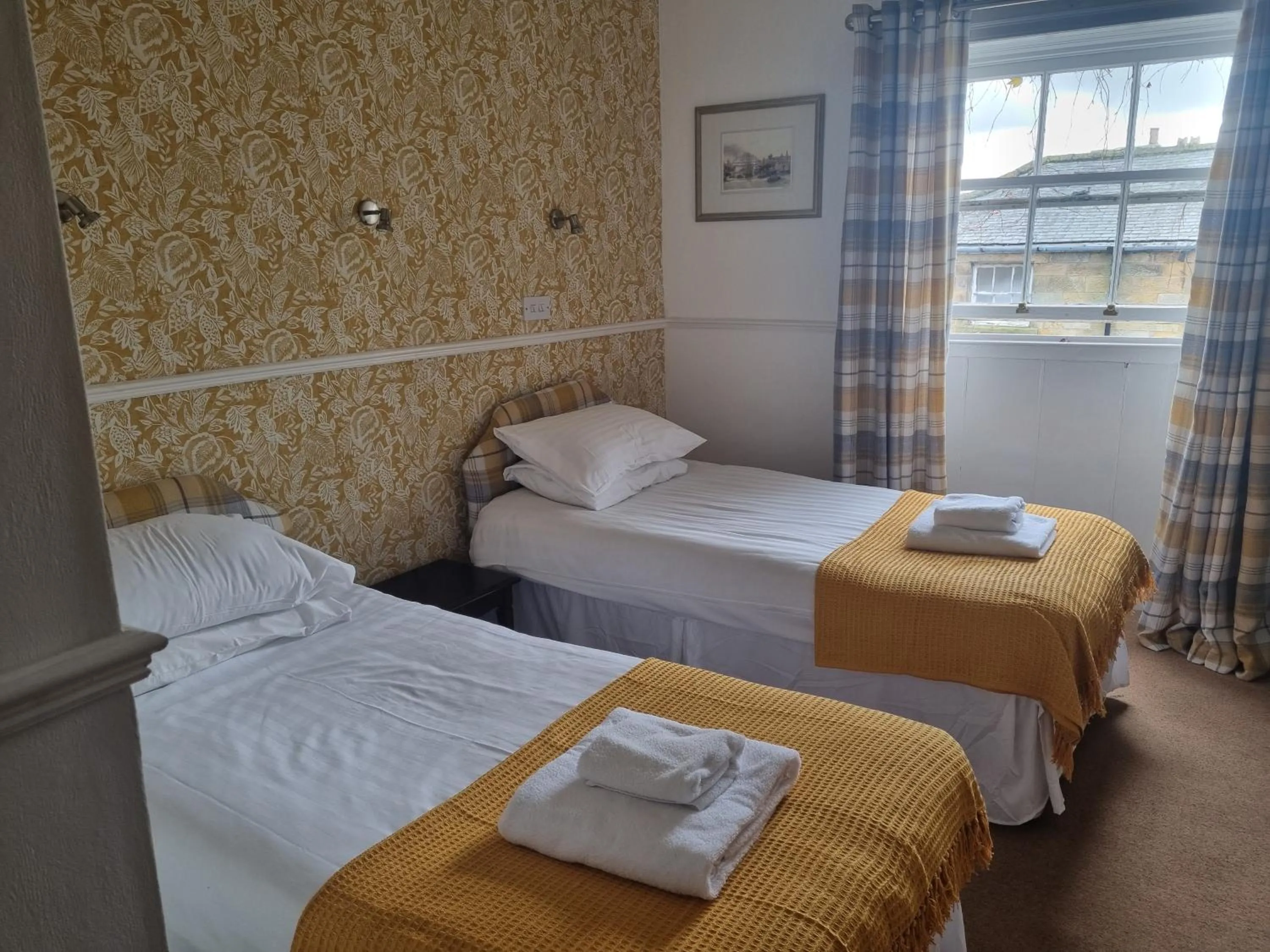 Bed in Blue Bell Hotel