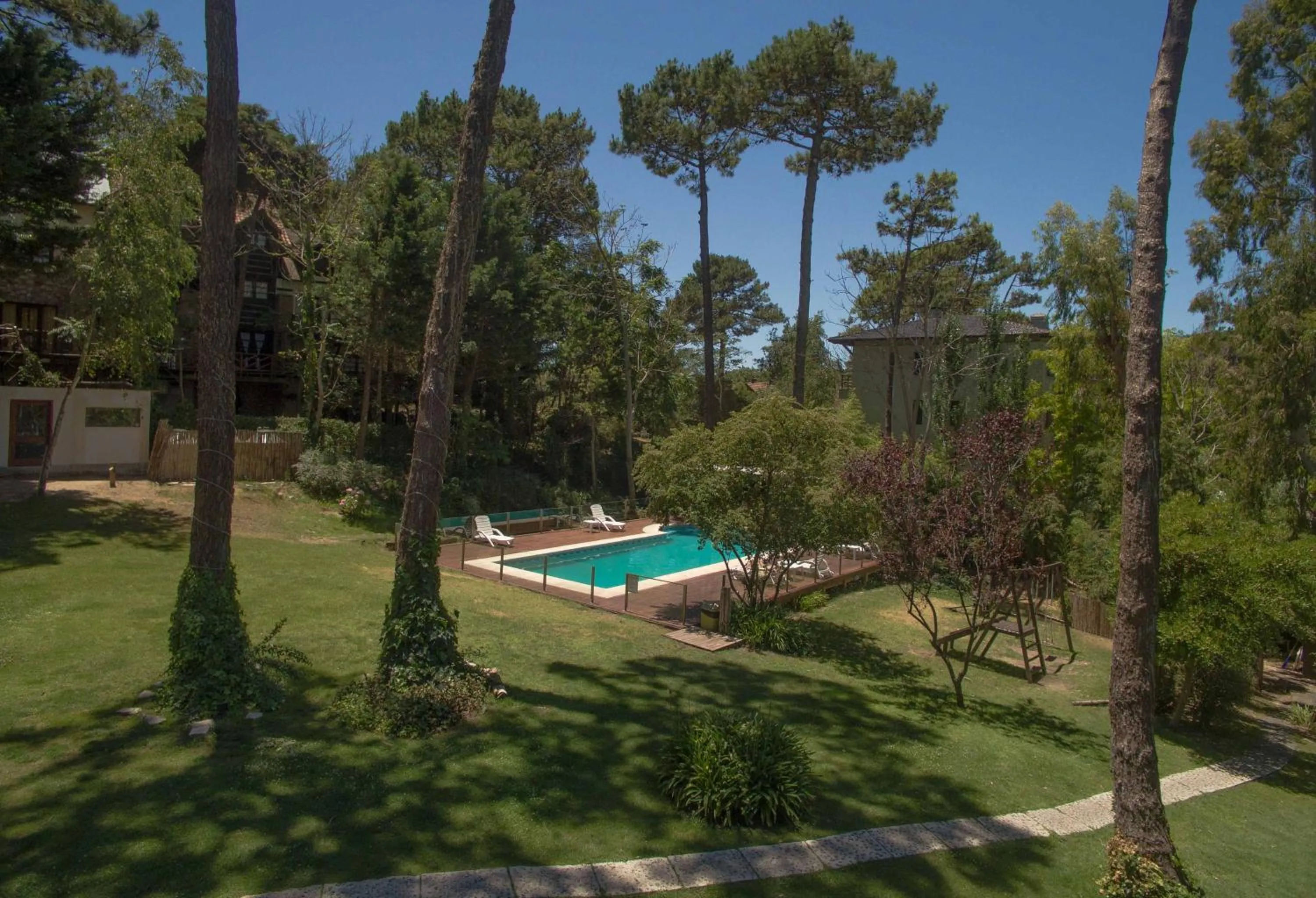 Swimming pool in Posada del Bosque By HS