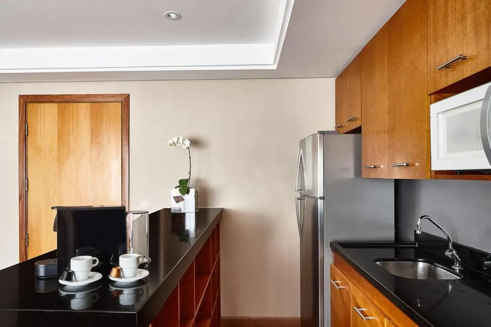 Kitchen or kitchenette in George V Casa Branca