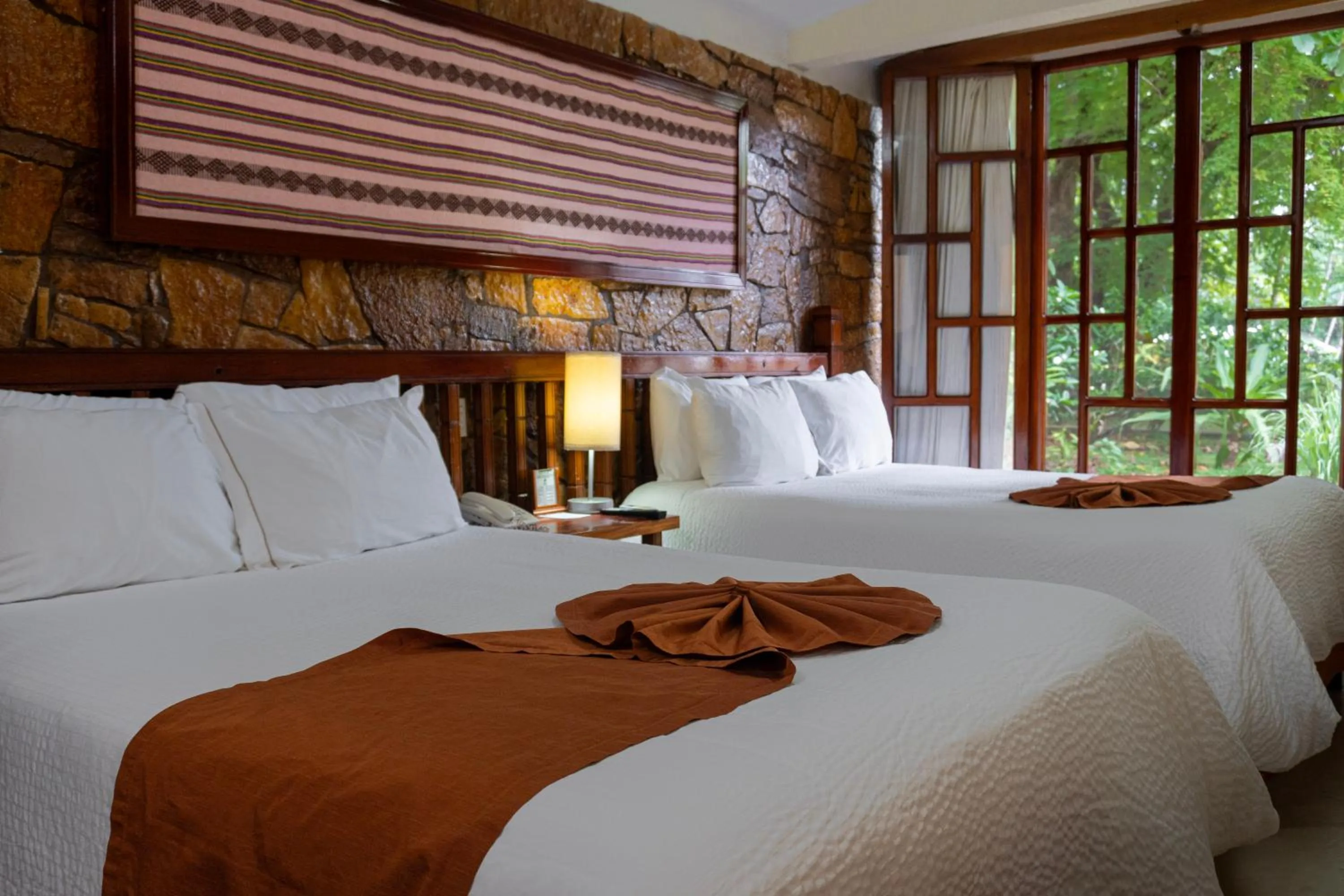 Photo of the whole room, Bed in Hotel Nututun Palenque