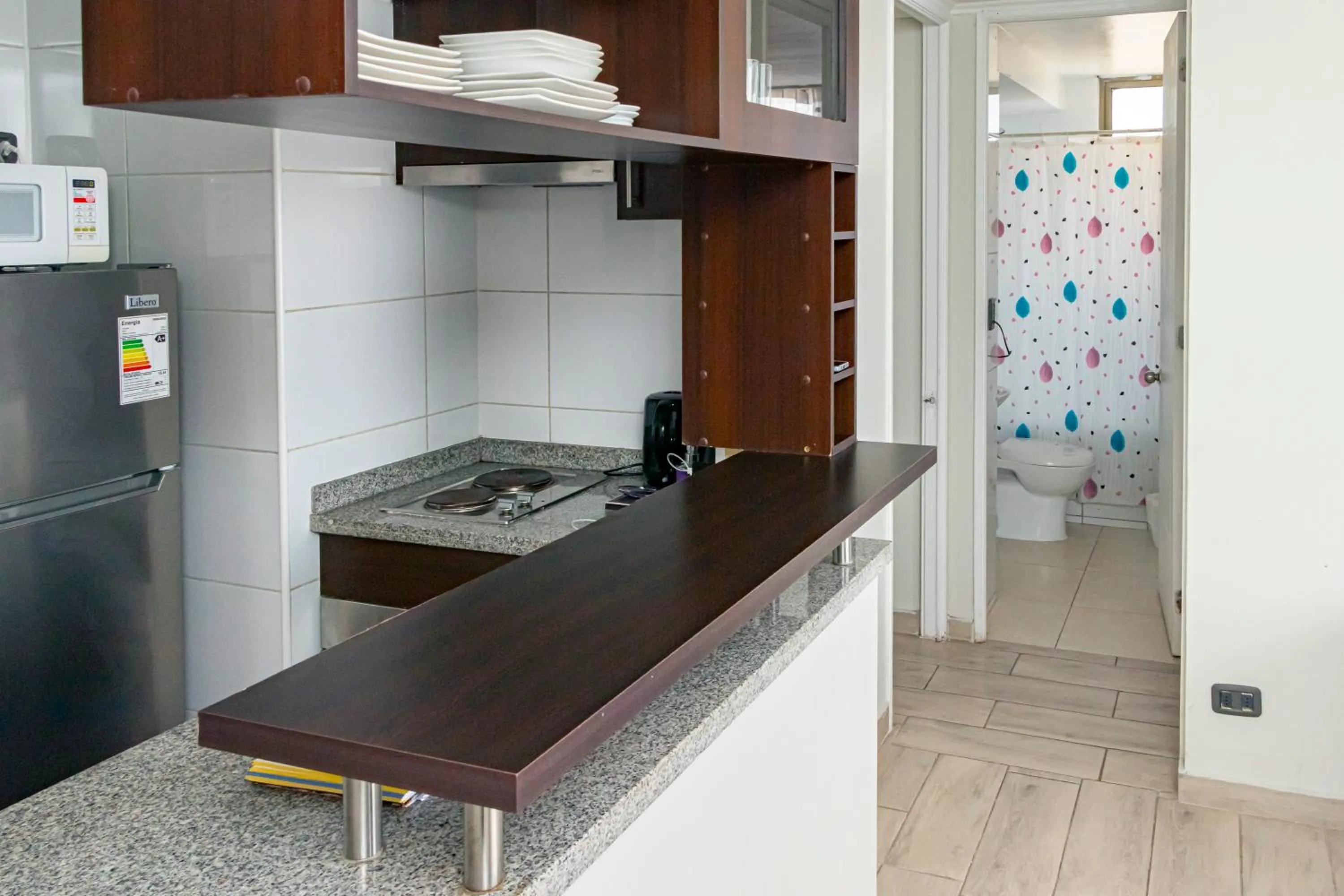 Kitchen or kitchenette in Departamentos Amoblados Torre Tagle