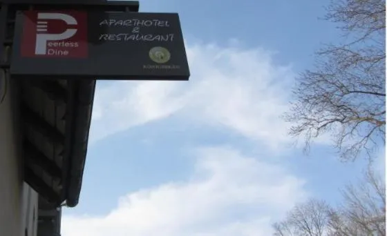 Logo/Certificate/Sign in Aparthotel Peerless Dine