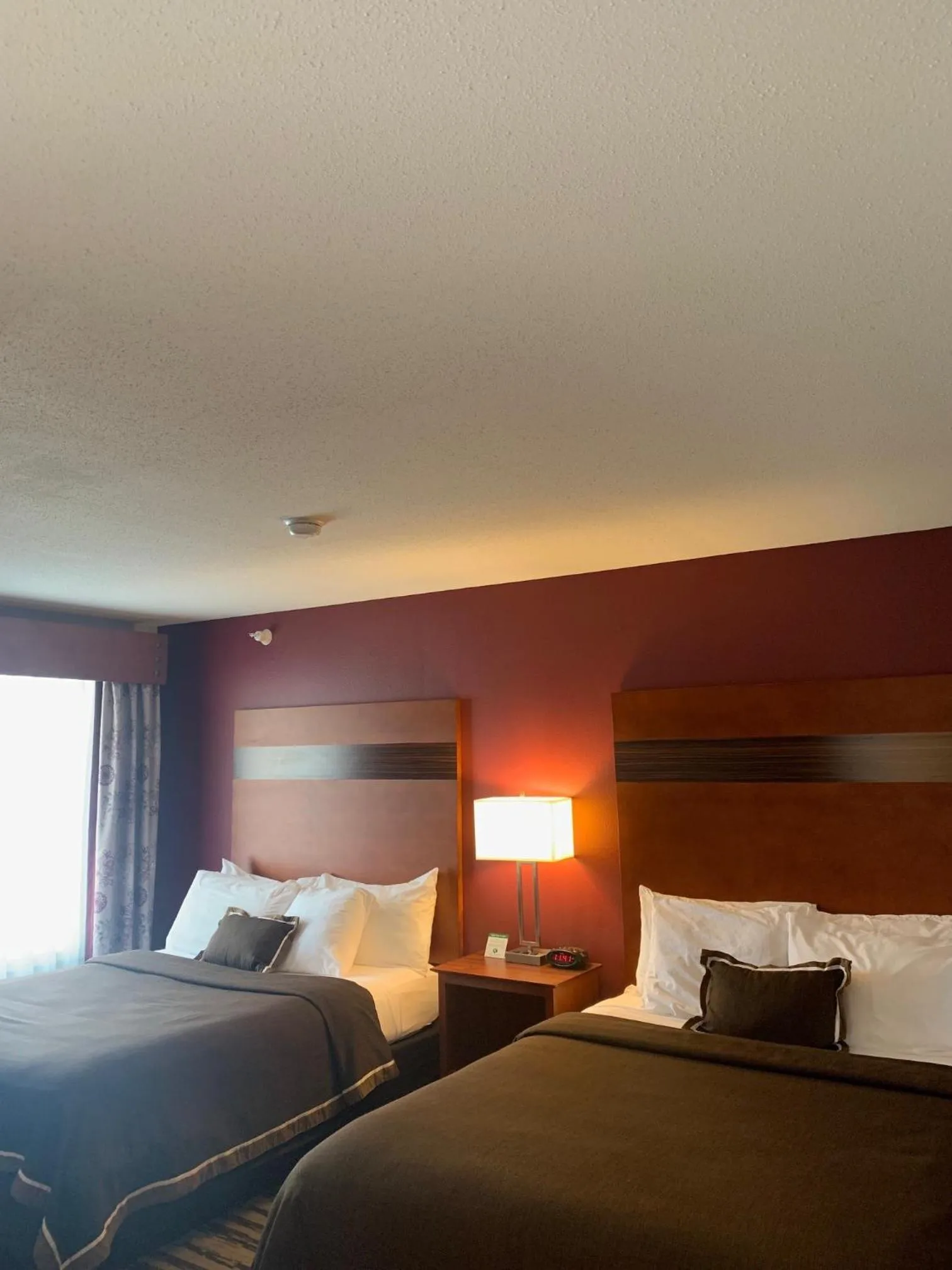 Bed in GrandStay Residential Suites Hotel