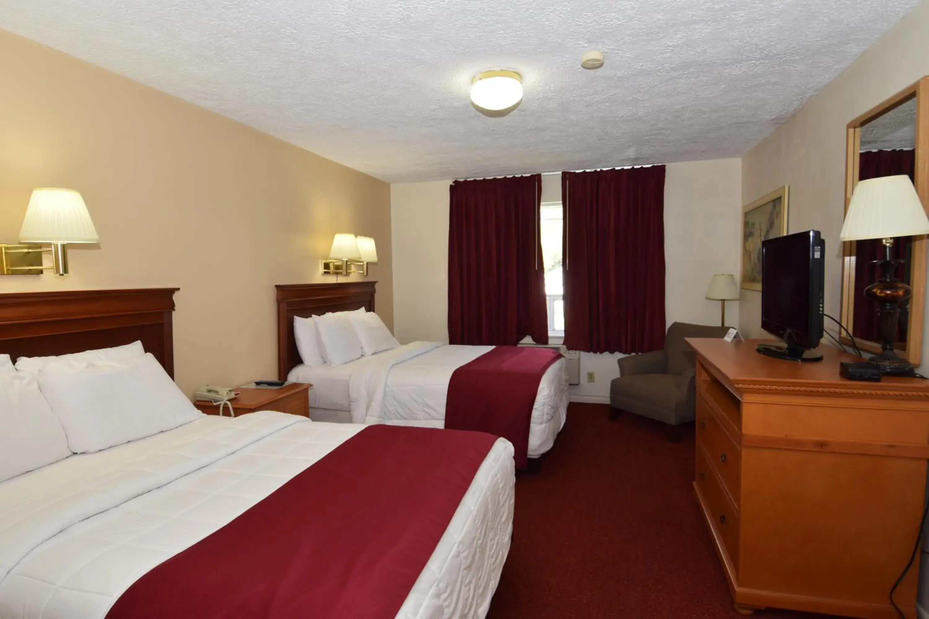 Bed in Knights Inn Oswego East Bed in Knights Inn Oswego East