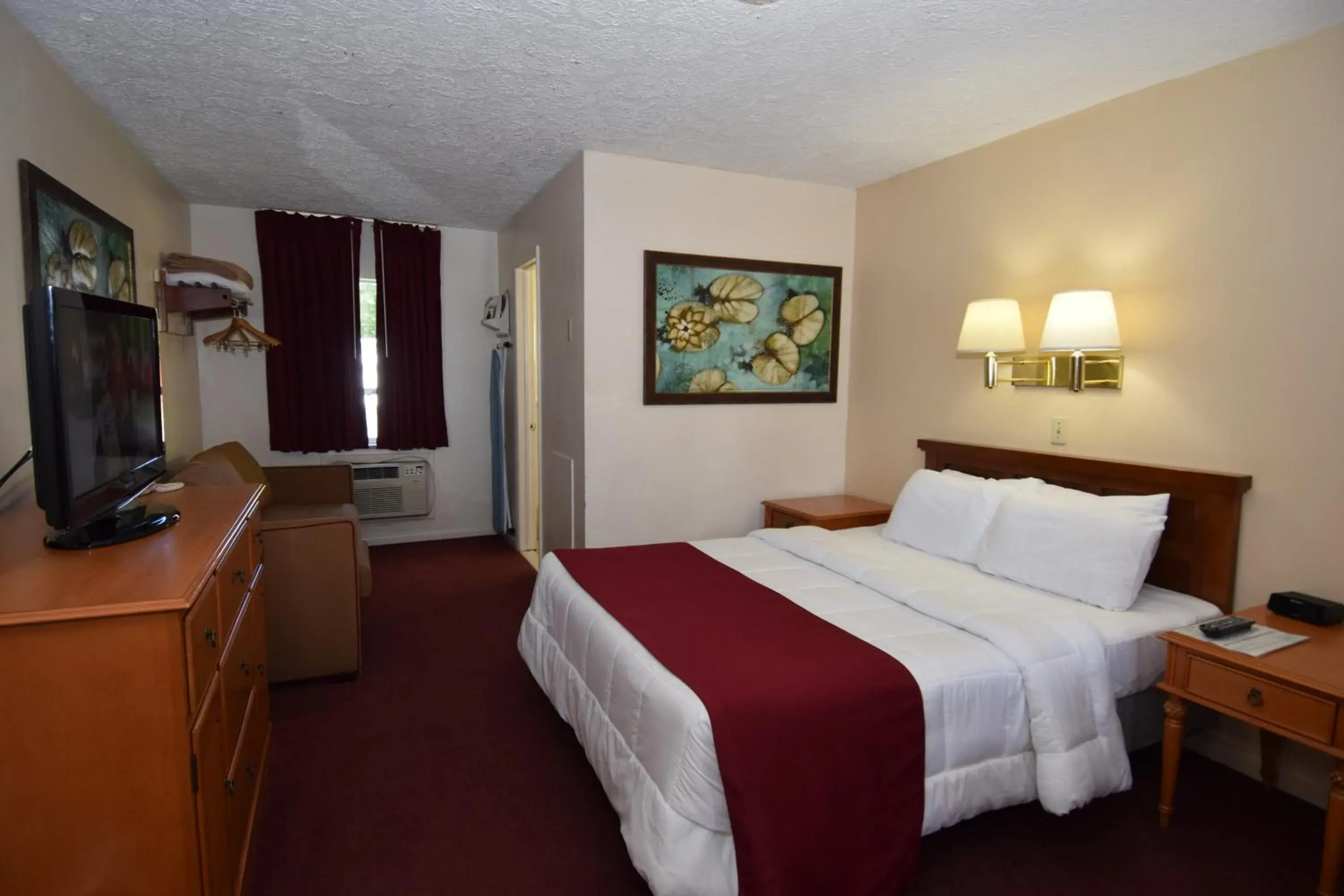 Bed in Knights Inn Oswego East Bed in Knights Inn Oswego East