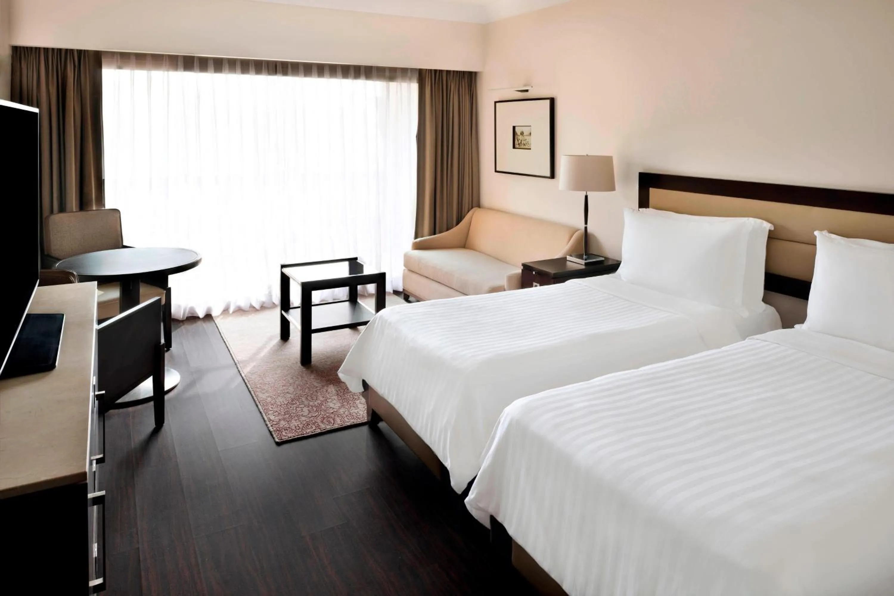 Photo of the whole room, Bed in Marriott Mena House, Cairo