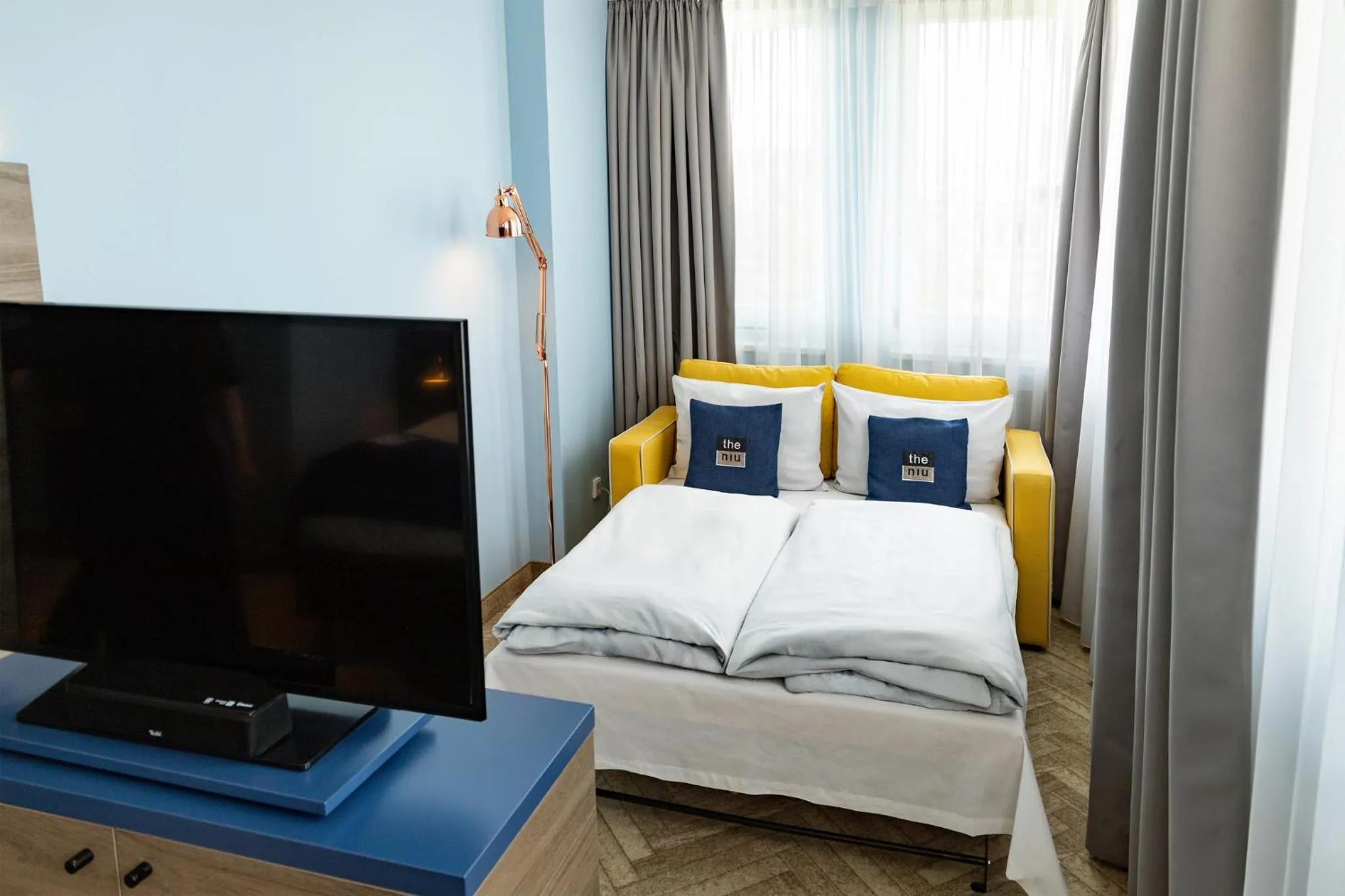 Photo of the whole room, Bed in Holiday Inn - the niu, Welly Kiel by IHG