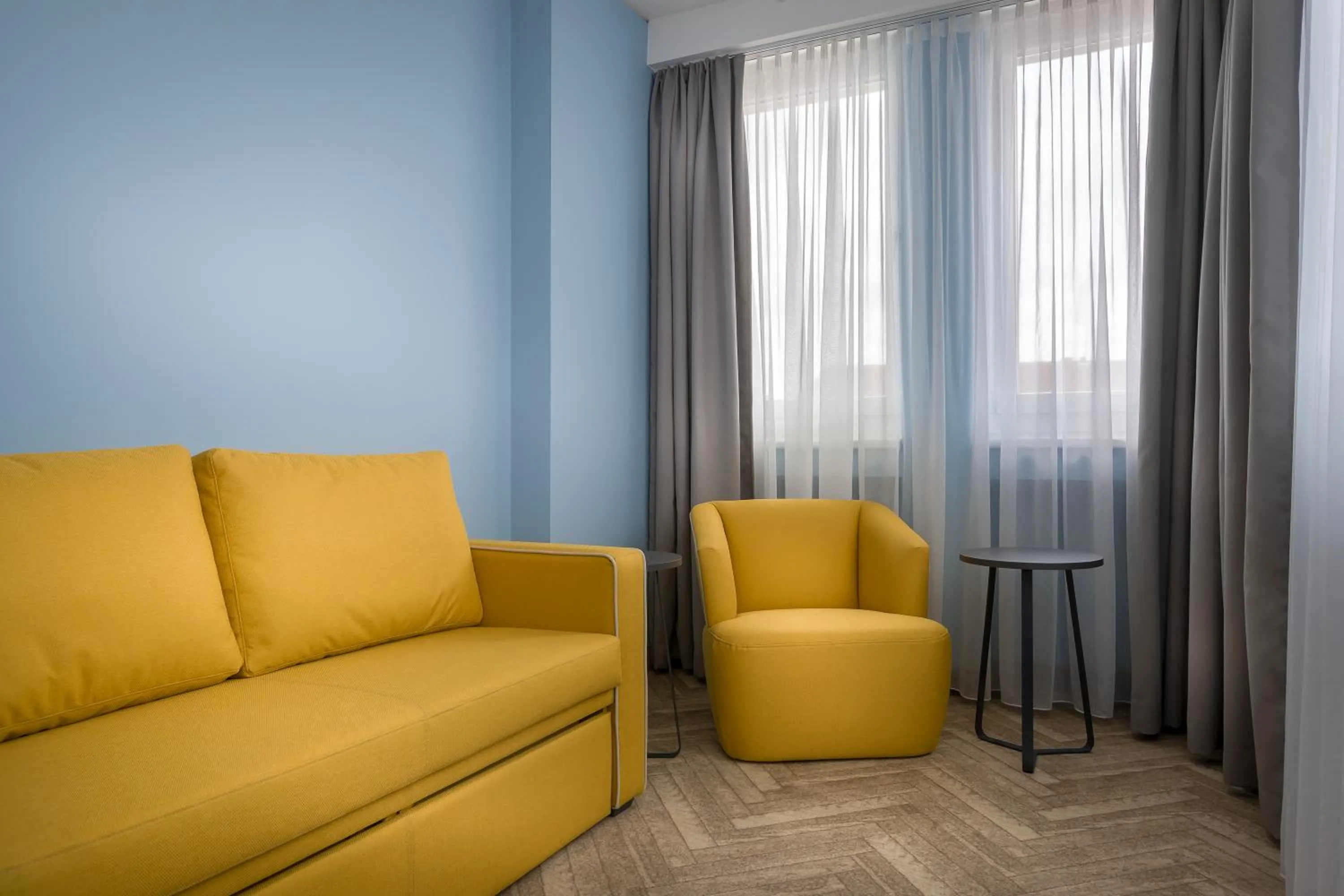Living room in Holiday Inn - the niu, Welly Kiel by IHG