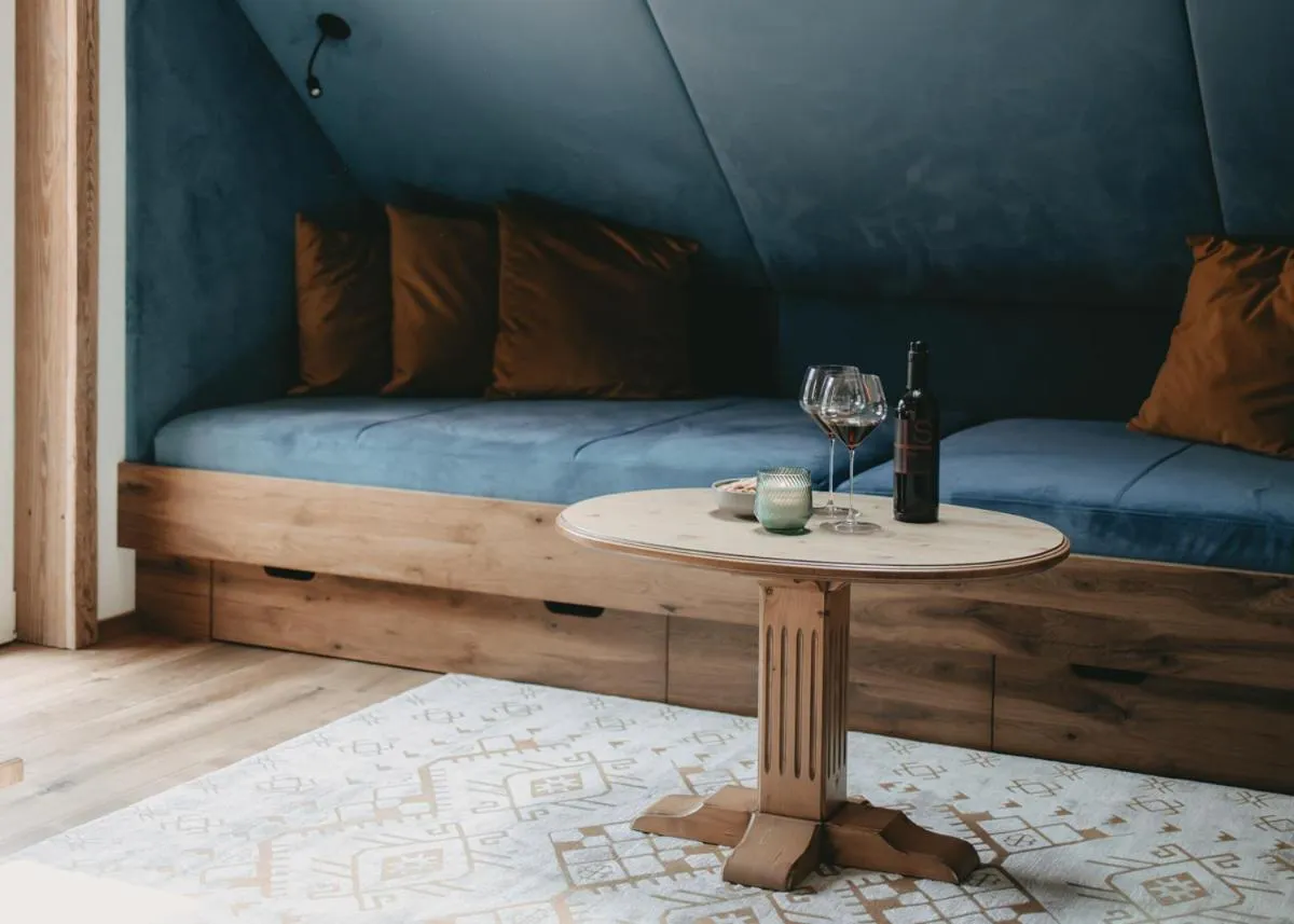 Seating area, Bed in Hotel Rosenhof Murau