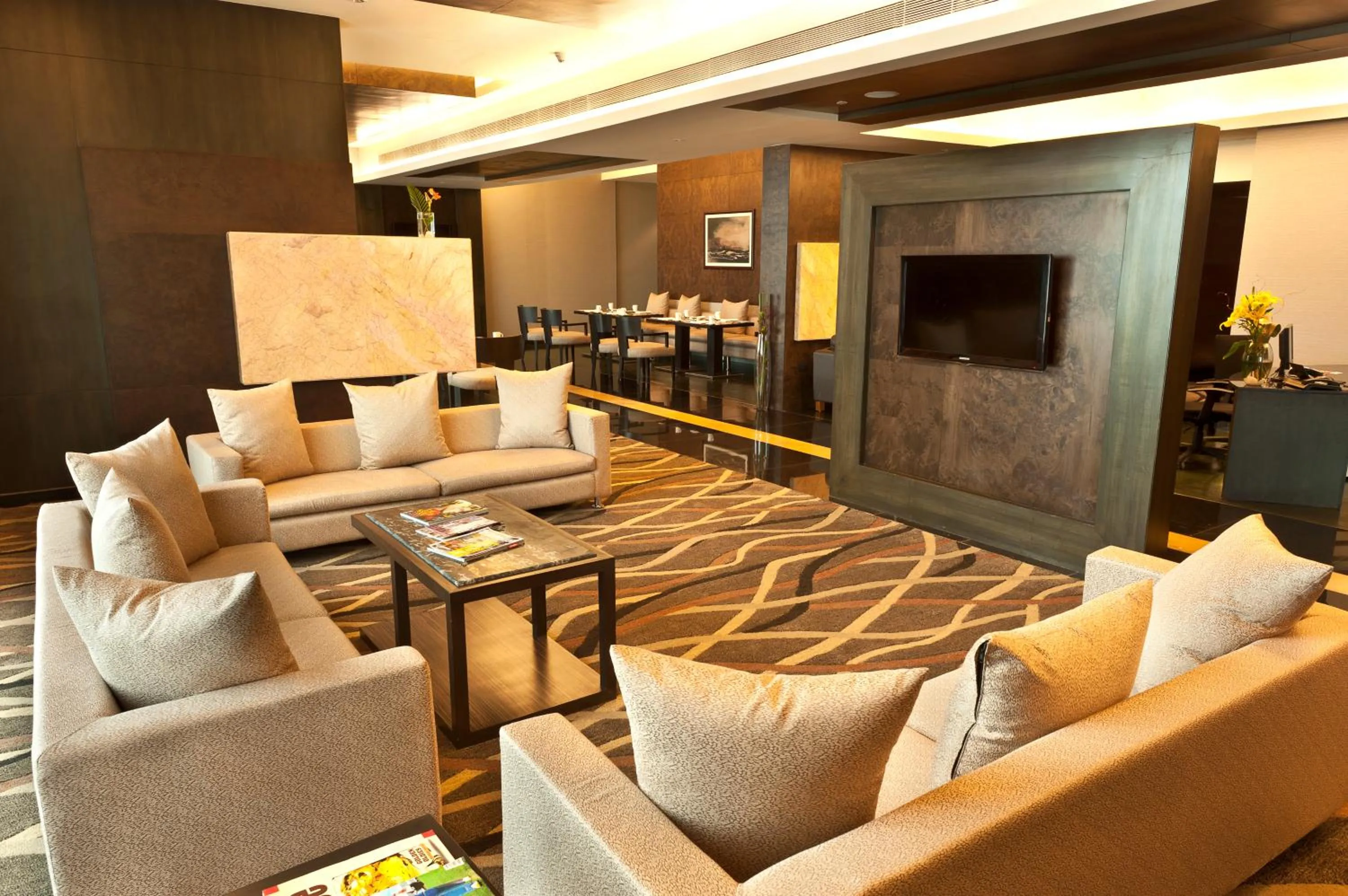 Living room in Gokulam Grand Hotel & Spa Bangalore