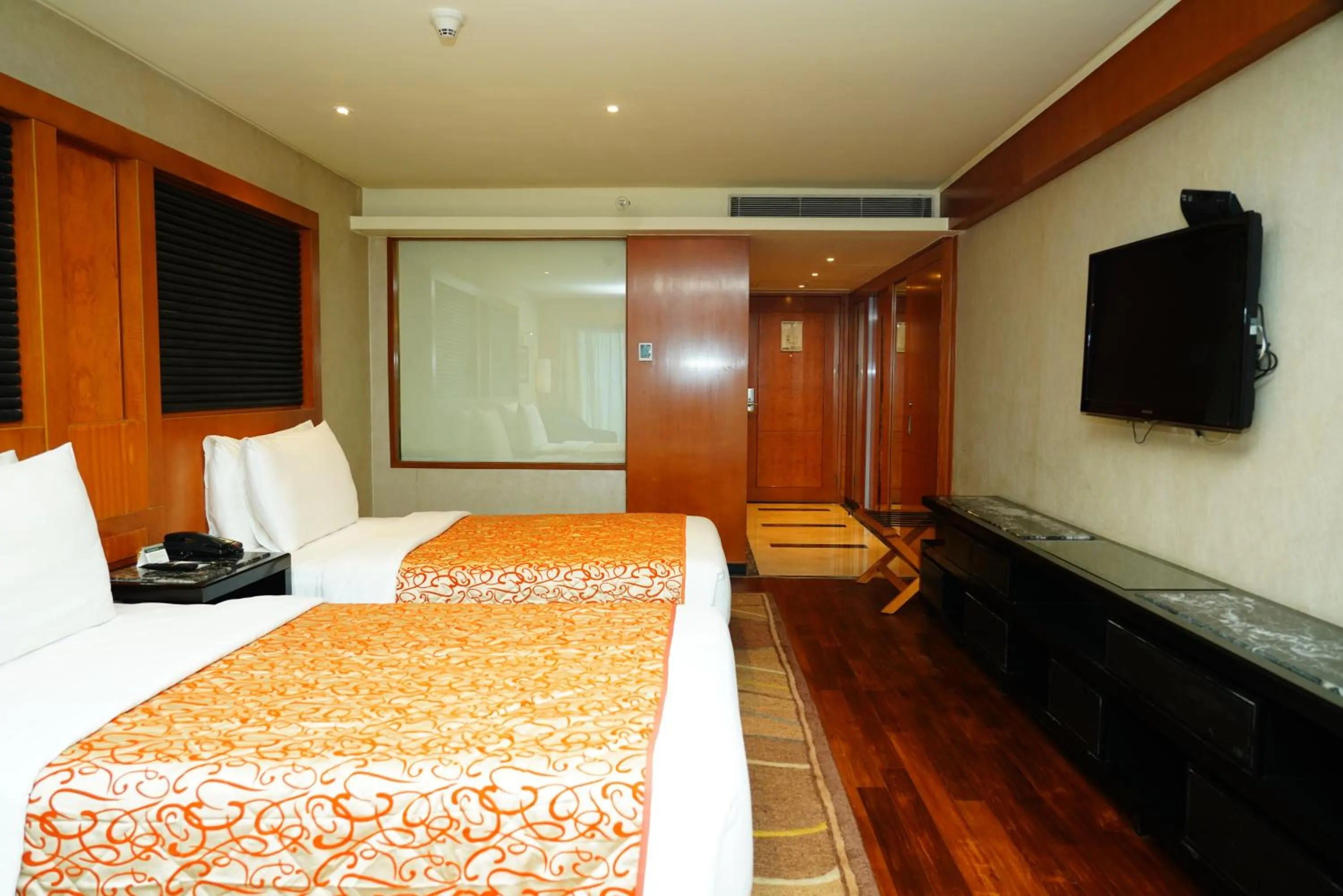 Bed in Gokulam Grand Hotel & Spa Bangalore